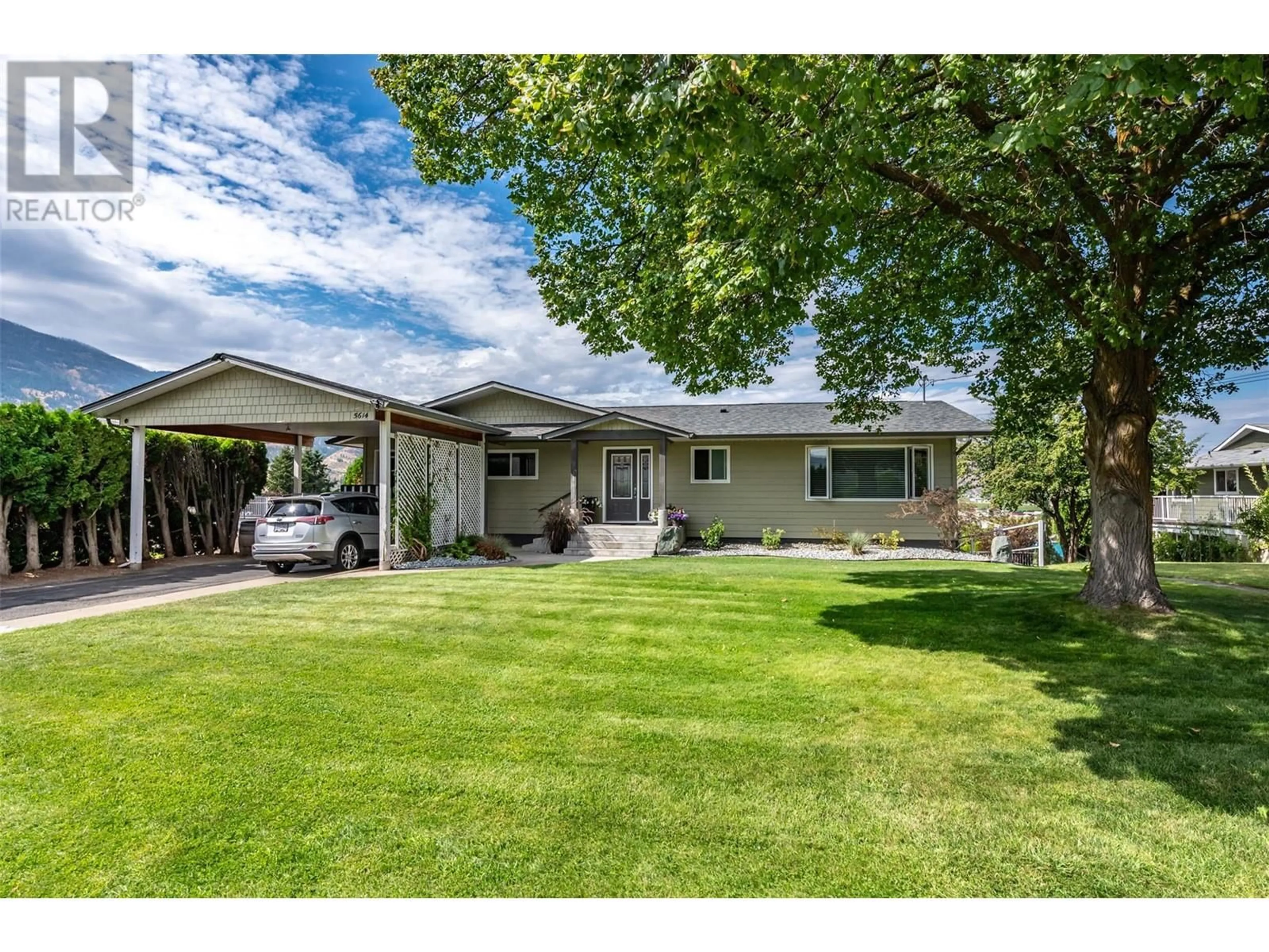 Home with vinyl exterior material, street for 5614 YARROW STREET, Oliver British Columbia V0H1T9