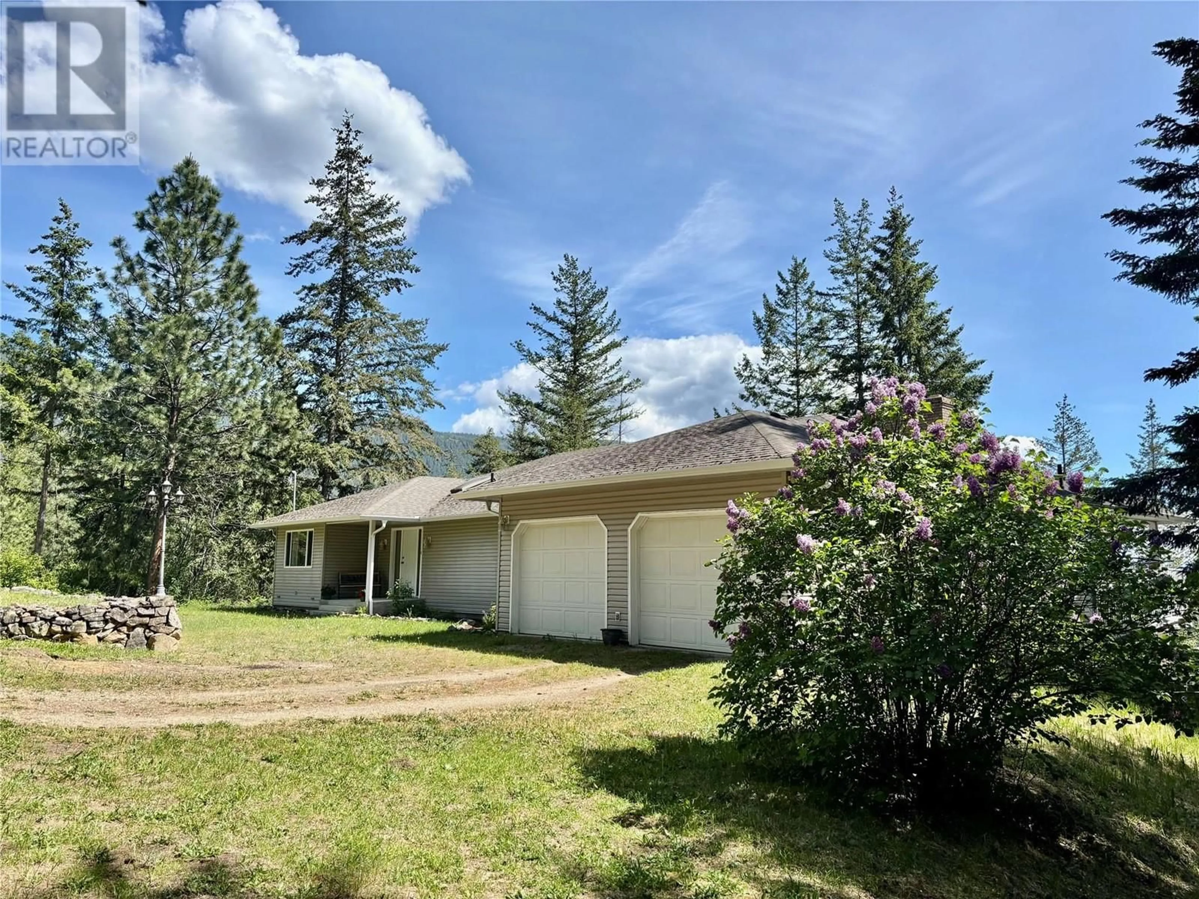 A pic from outside/outdoor area/front of a property/back of a property/a pic from drone, mountain view for 1611 TAPPEN NOTCH HILL ROAD, Tappen British Columbia V0E2X0