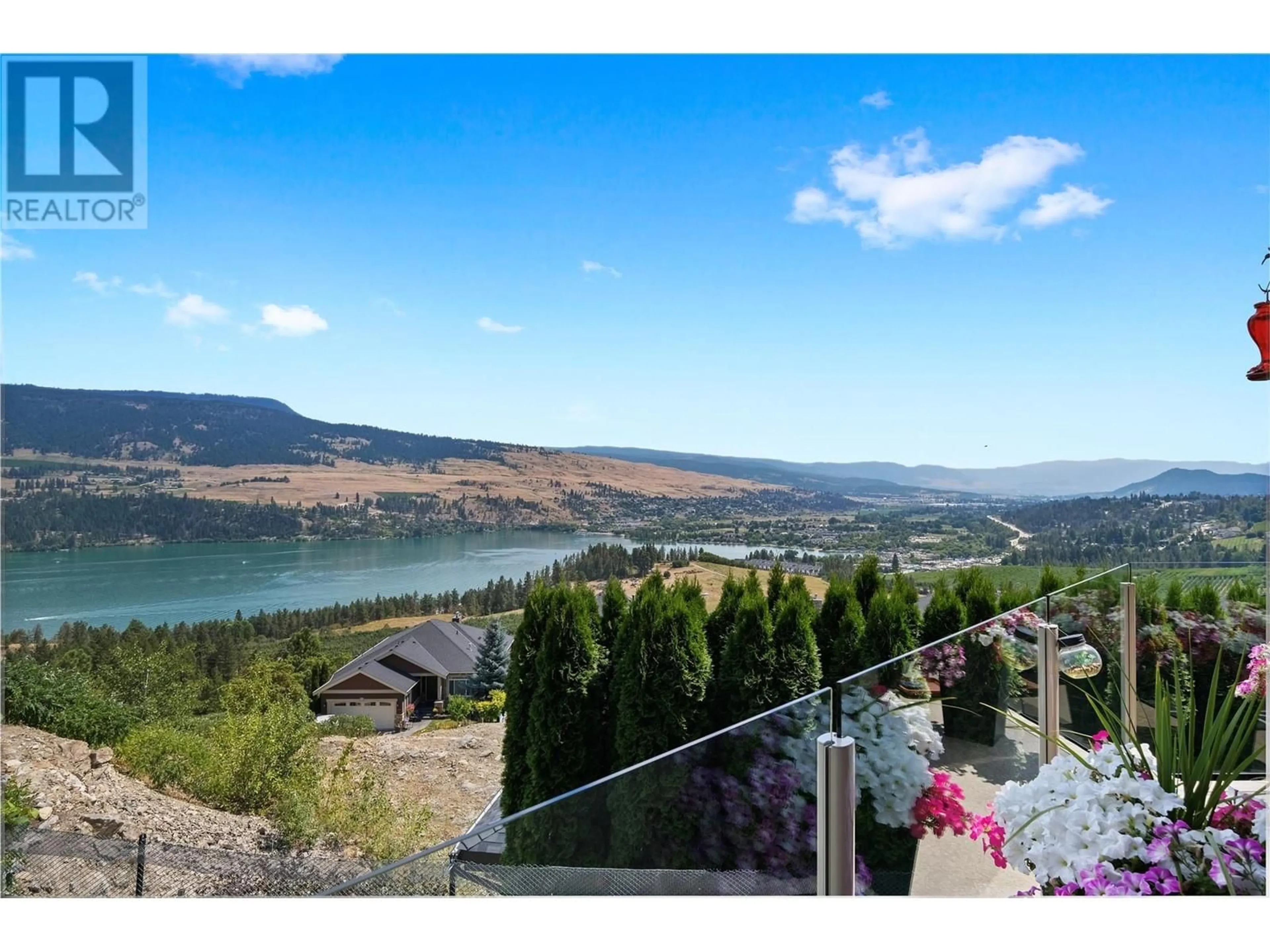 A pic from outside/outdoor area/front of a property/back of a property/a pic from drone, water/lake/river/ocean view for 2602 LAKE BREEZE COURT, Lake Country British Columbia V4V2N1