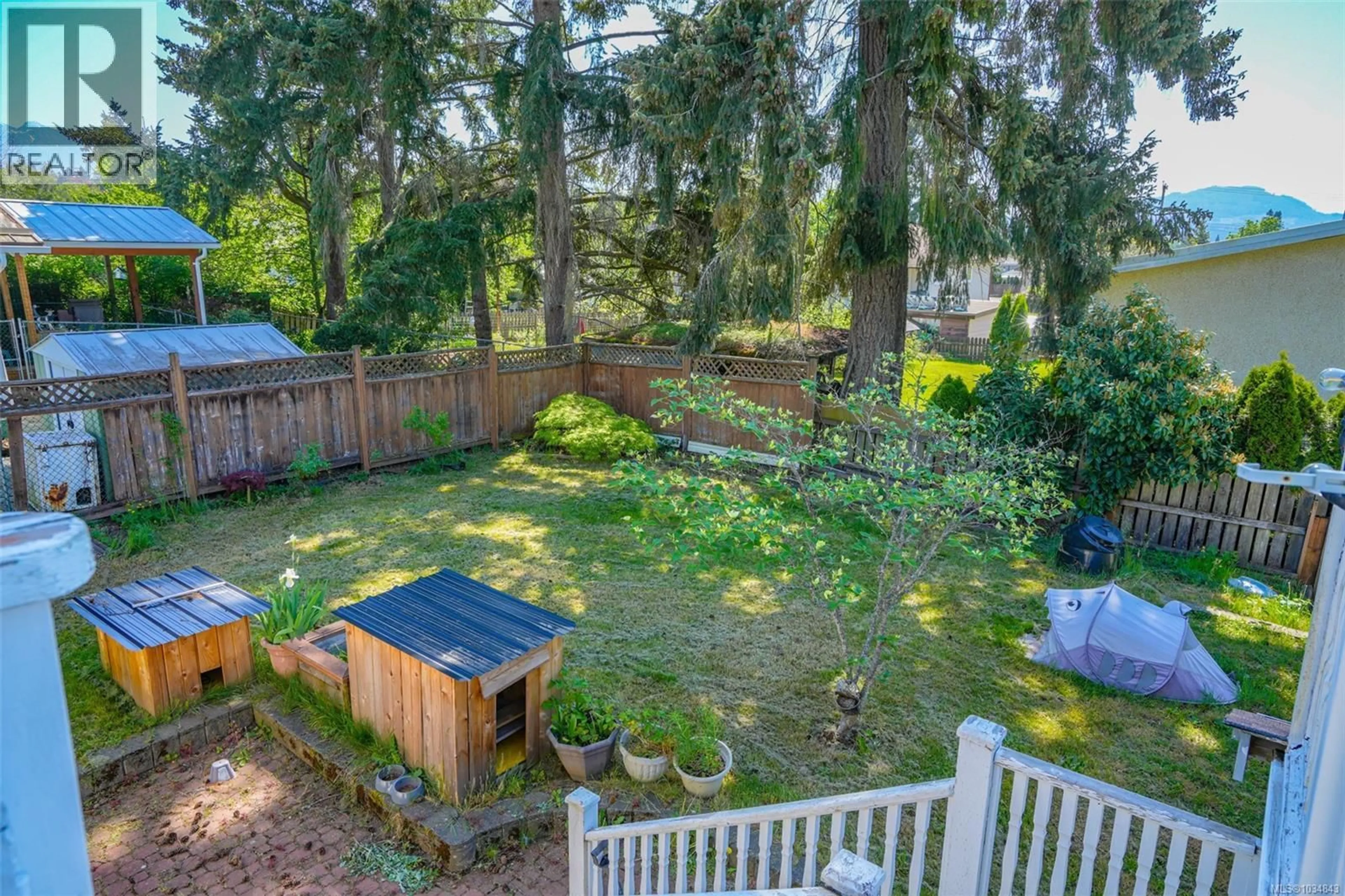 A pic from outside/outdoor area/front of a property/back of a property/a pic from drone, forest/trees view for 4594 ALWYN STREET, Port Alberni British Columbia V9Y5V1