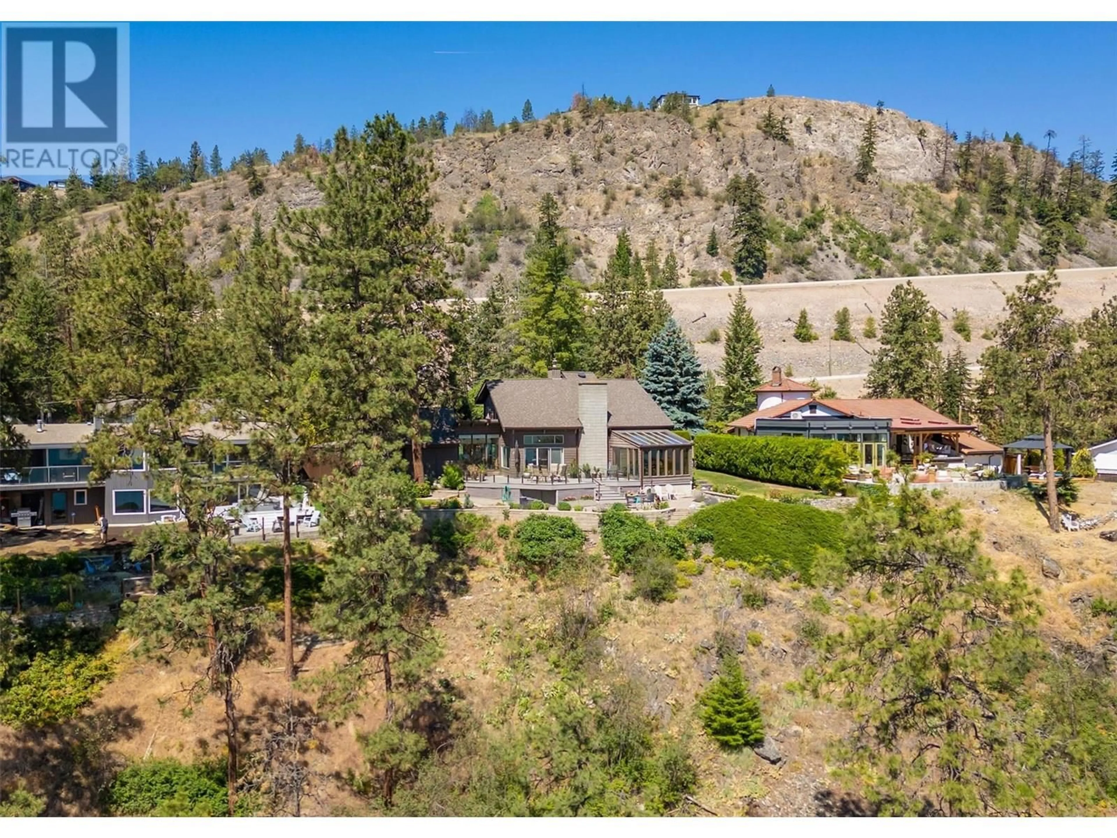 A pic from outside/outdoor area/front of a property/back of a property/a pic from drone, mountain view for 12665 PONDEROSA DRIVE, Lake Country British Columbia V4V2G9