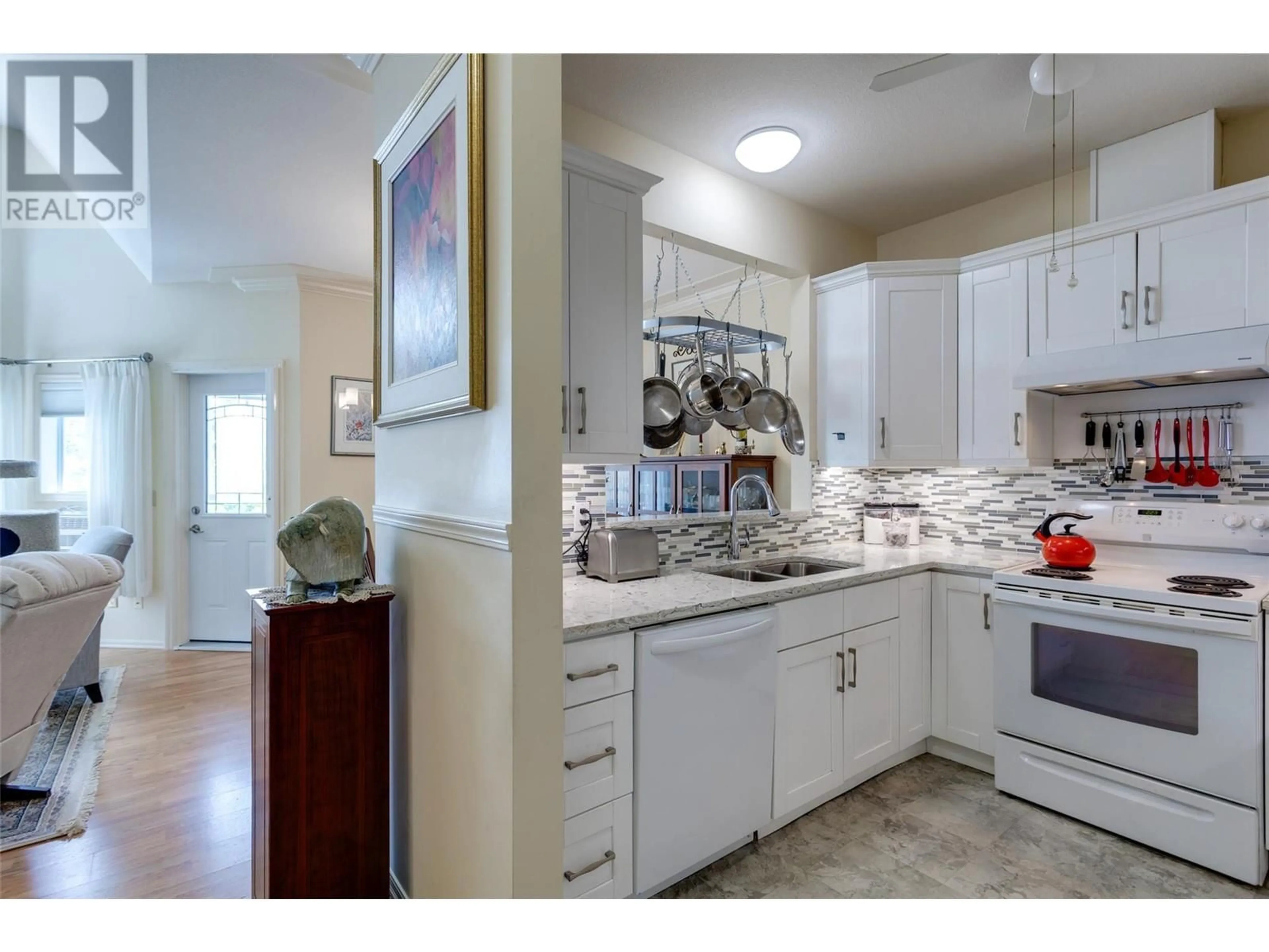 Open concept kitchen, ceramic/tile floor for 310 - 877 KLO ROAD, Kelowna British Columbia V1Y9R1