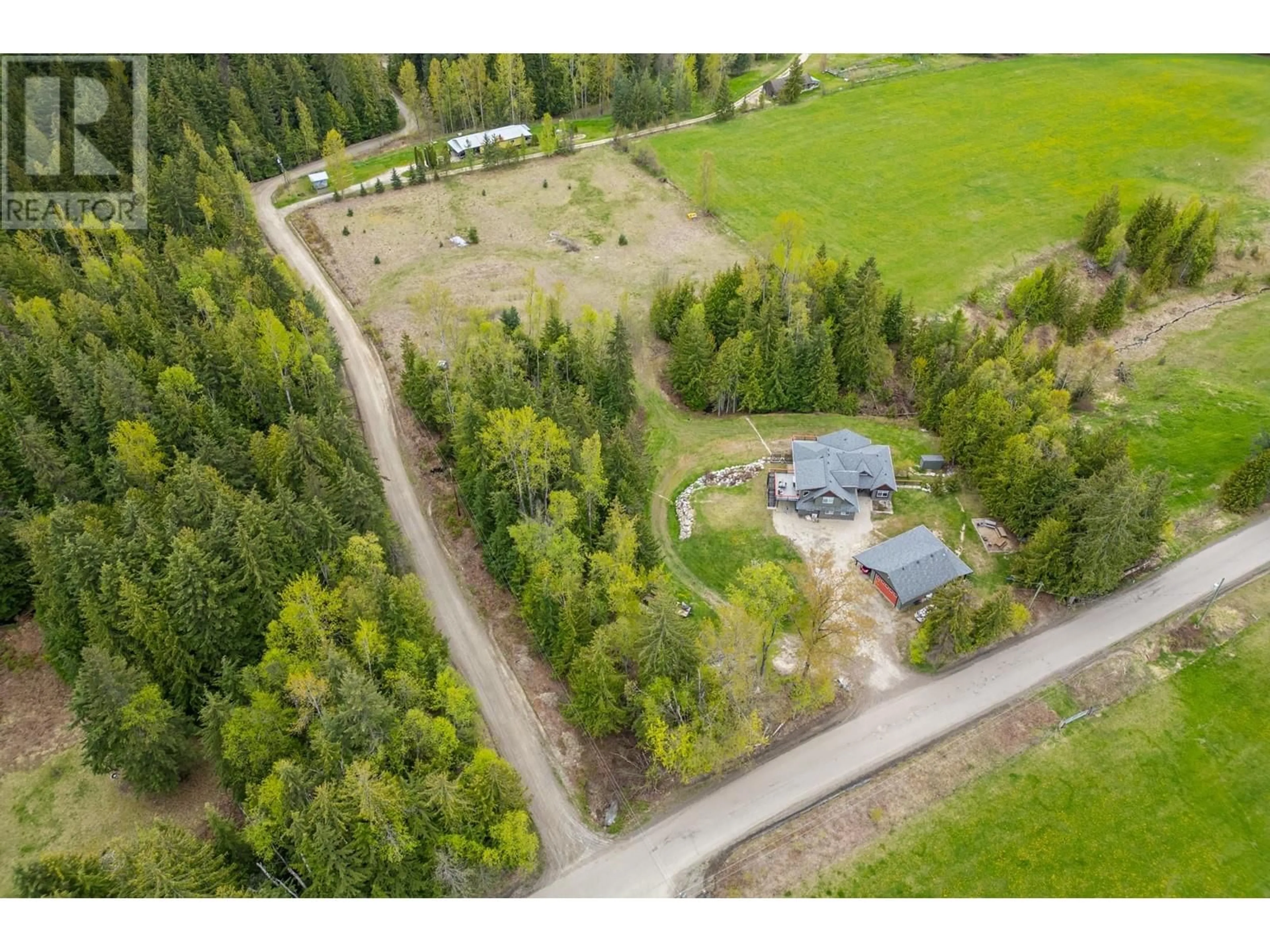 A pic from outside/outdoor area/front of a property/back of a property/a pic from drone, forest/trees view for 787 CRESCENT BAY ROAD, Nakusp British Columbia V0G1R1