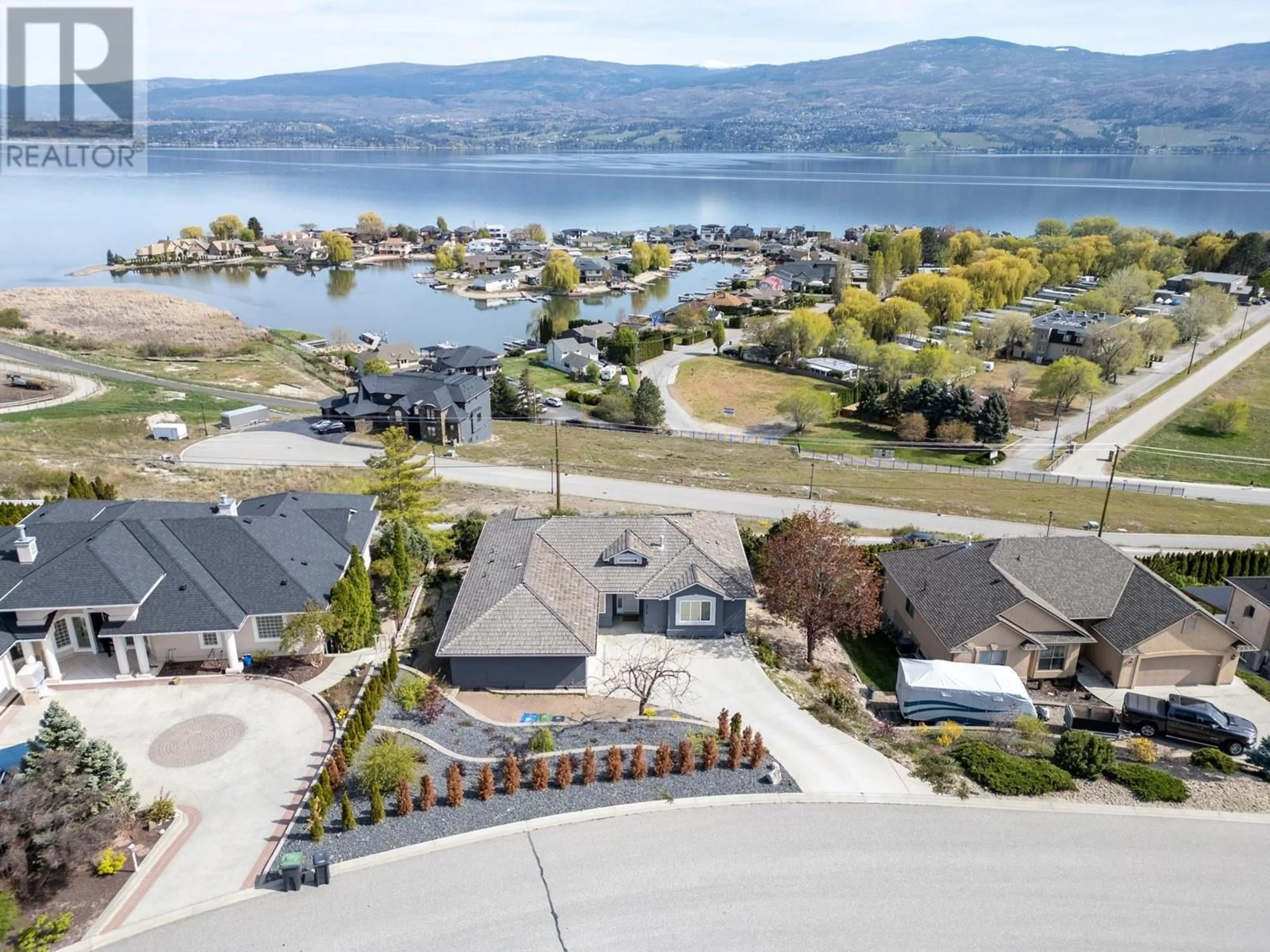 A pic from outside/outdoor area/front of a property/back of a property/a pic from drone, water/lake/river/ocean view for 3513 EMPIRE PLACE, West Kelowna British Columbia V4T1Y5