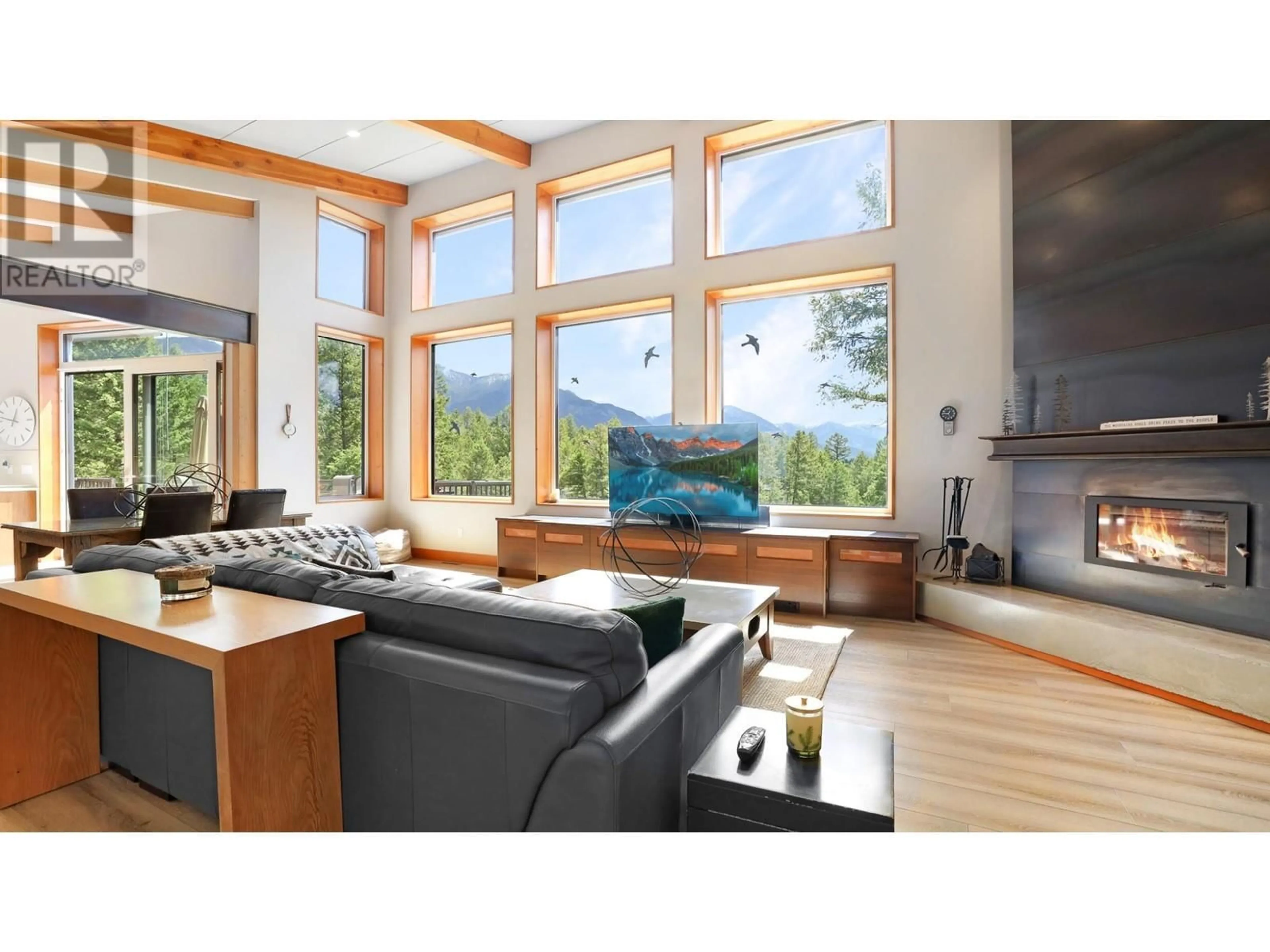 Living room with furniture, wood/laminate floor for 2160 KOOTENAY 3 ROAD, Windermere British Columbia V0B2L1
