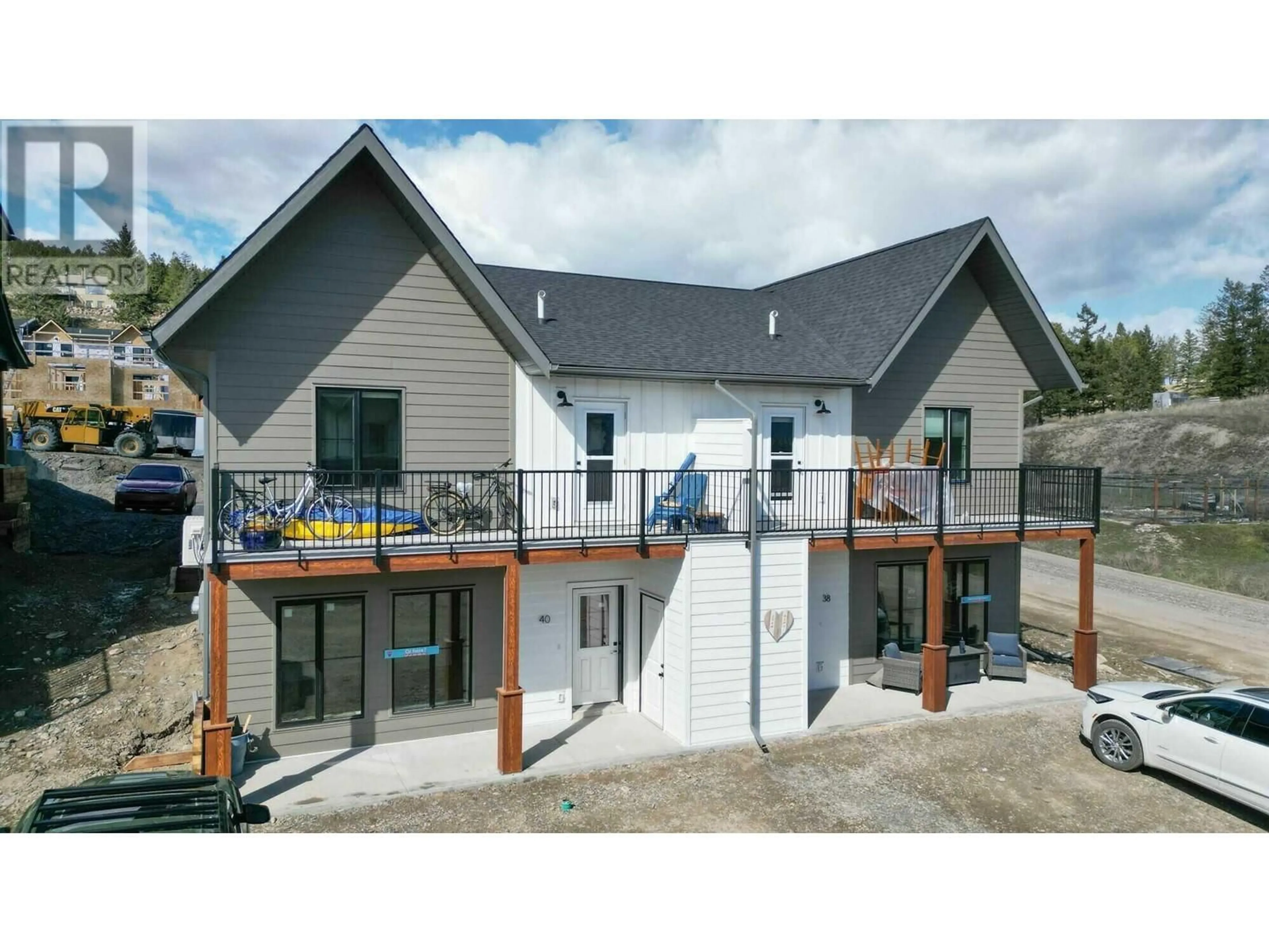 A pic from outside/outdoor area/front of a property/back of a property/a pic from drone, building for 52 - 2102 PINE TREE ROAD, Invermere British Columbia V0A1K4