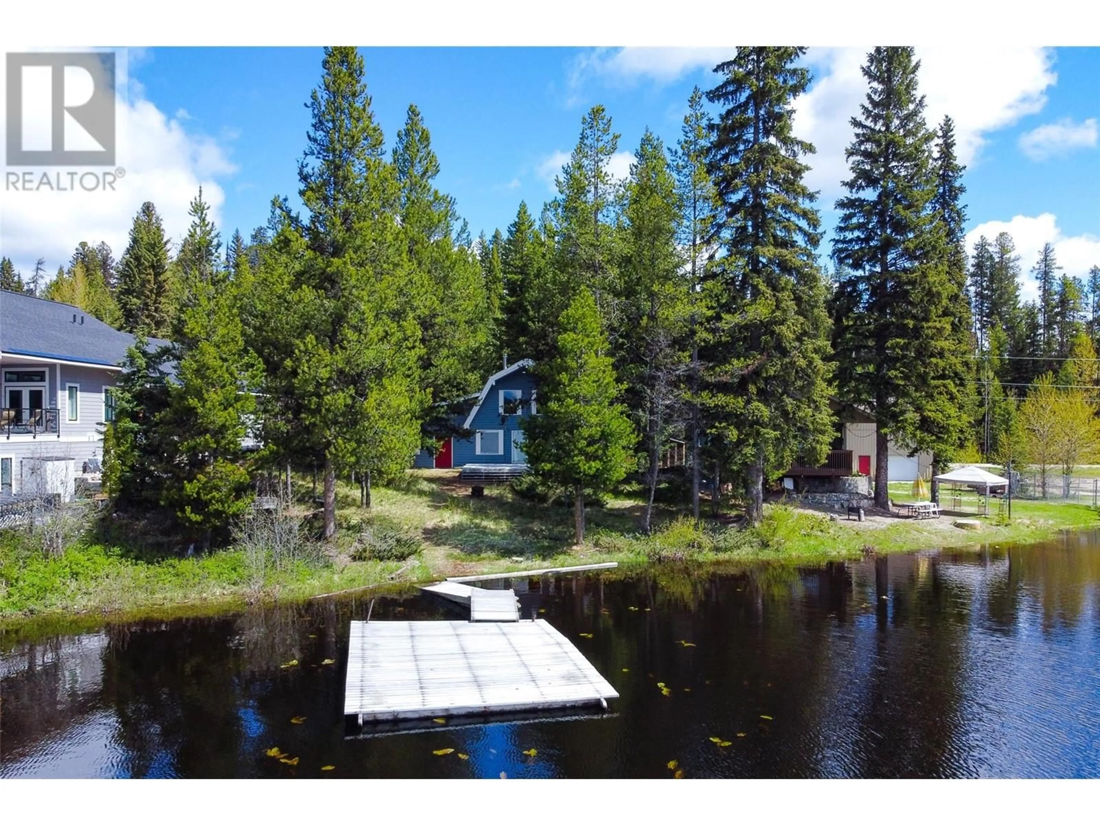 A pic from outside/outdoor area/front of a property/back of a property/a pic from drone, water/lake/river/ocean view for 840 IDABEL LAKE ROAD, Kelowna British Columbia V1P1K4