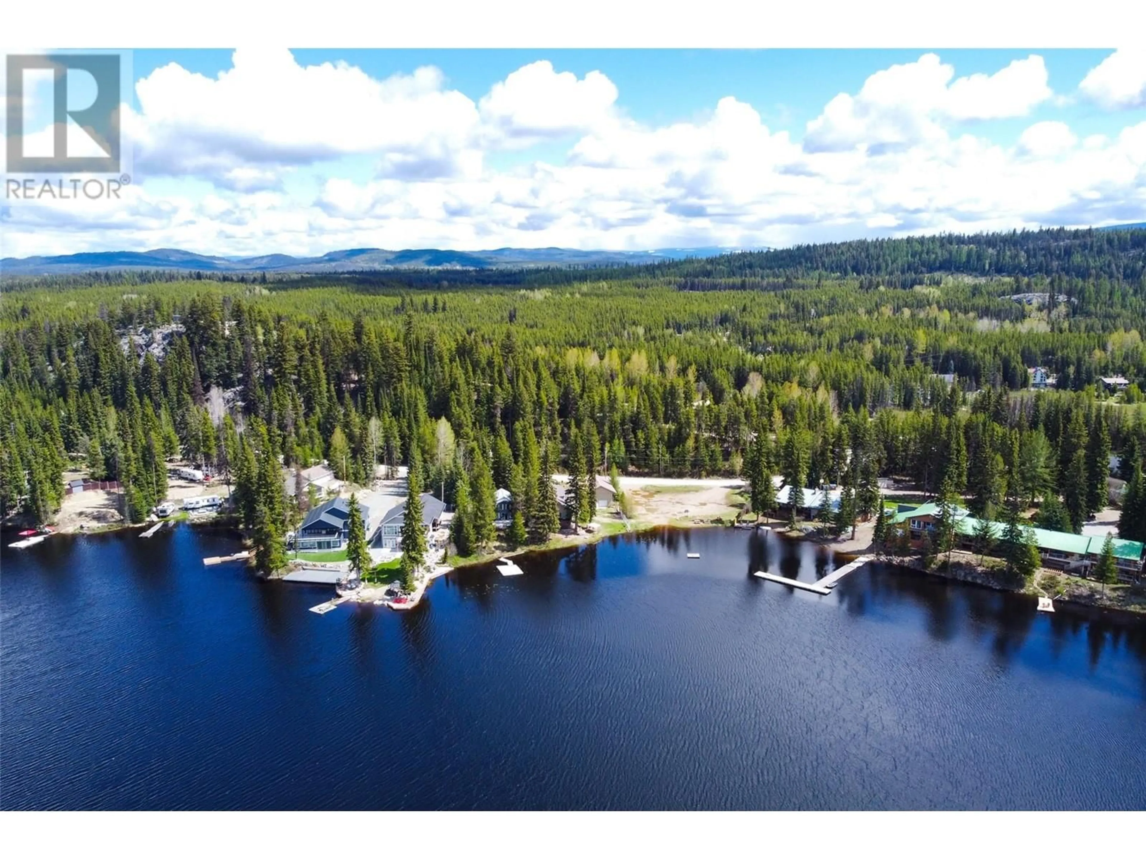 A pic from outside/outdoor area/front of a property/back of a property/a pic from drone, water/lake/river/ocean view for 840 IDABEL LAKE ROAD, Kelowna British Columbia V1P1K4