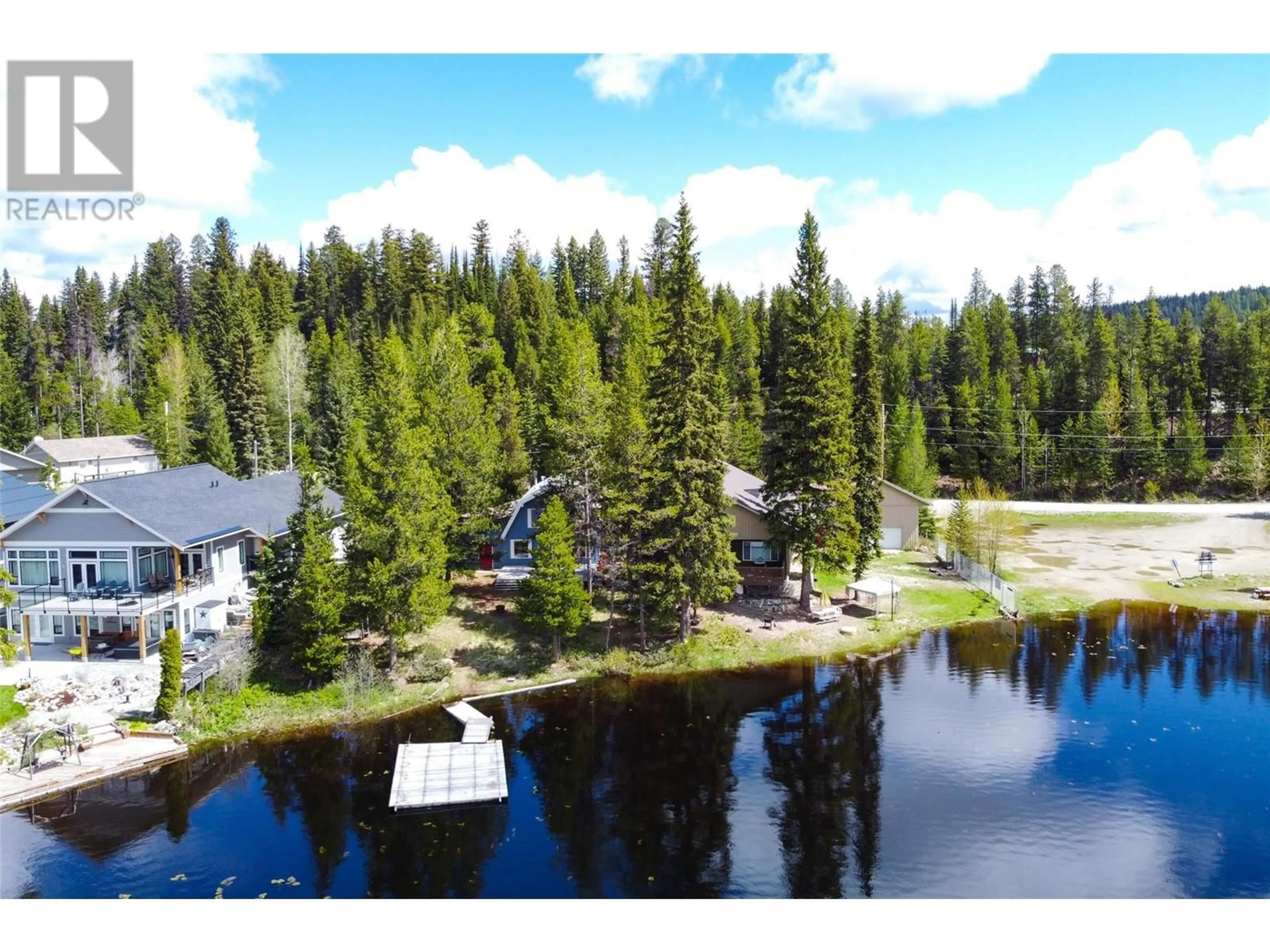 A pic from outside/outdoor area/front of a property/back of a property/a pic from drone, water/lake/river/ocean view for 840 IDABEL LAKE ROAD, Kelowna British Columbia V1P1K4