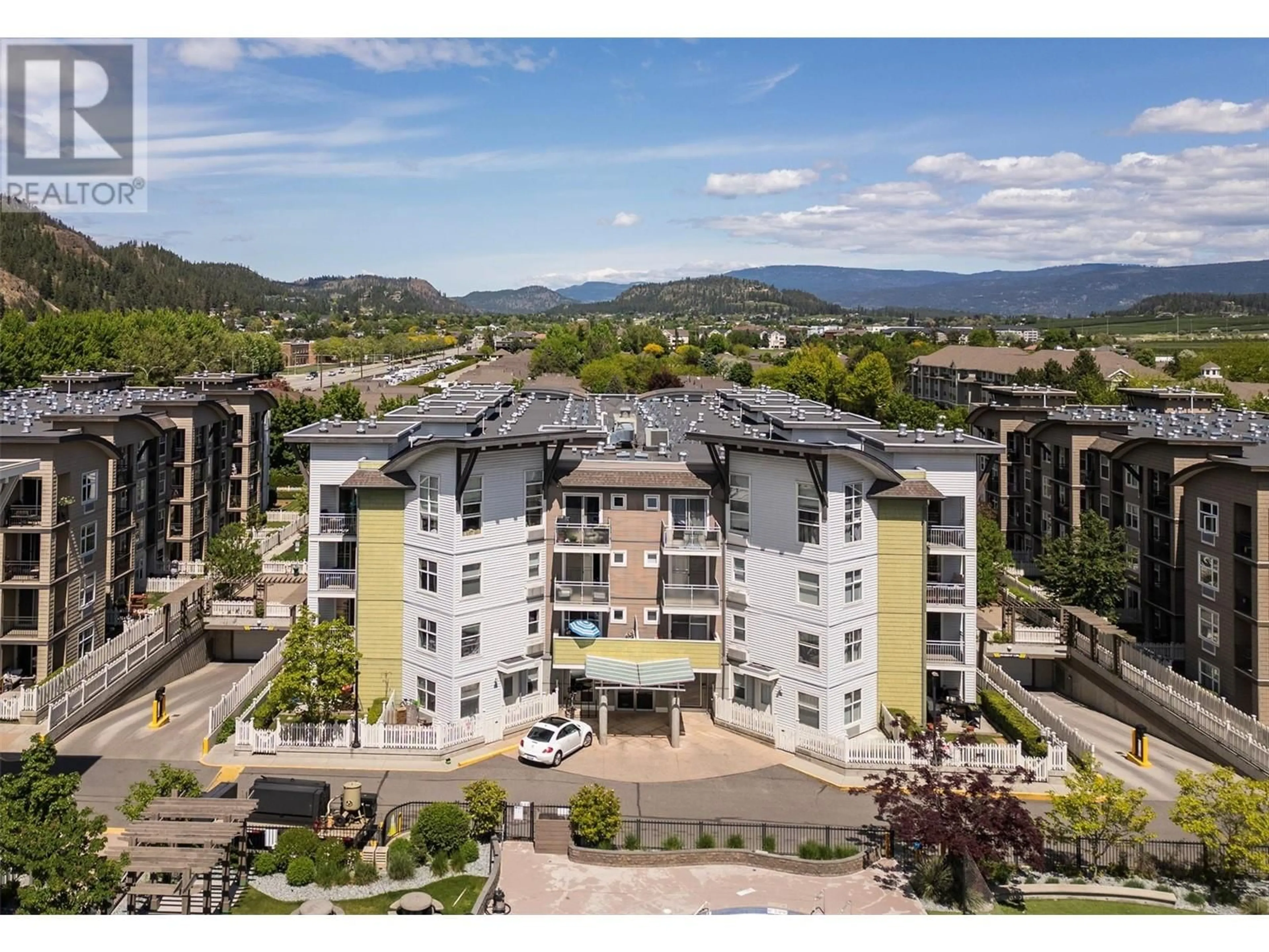 A pic from outside/outdoor area/front of a property/back of a property/a pic from drone, mountain view for 300 - 539 YATES ROAD, Kelowna British Columbia V1V2T8