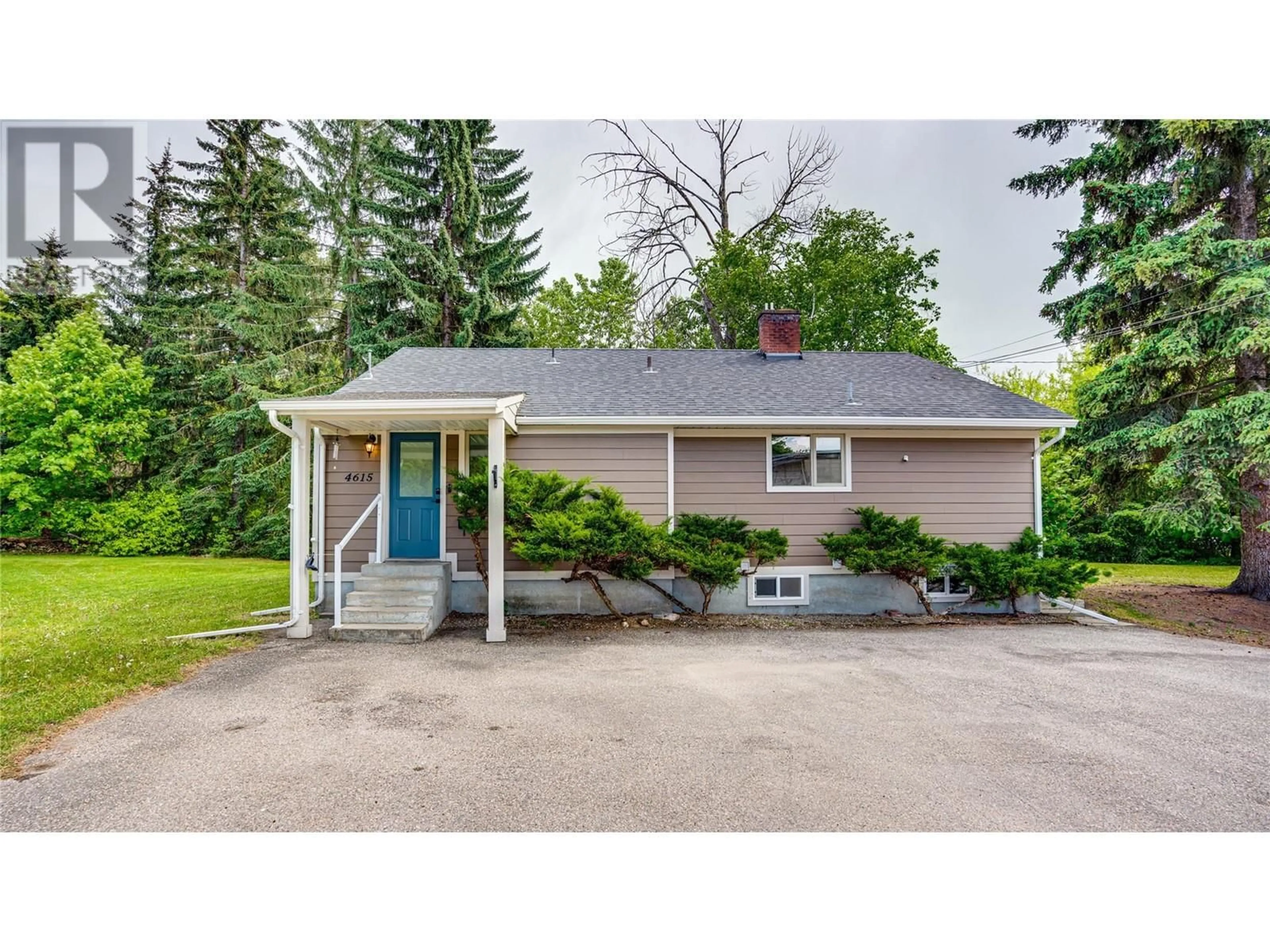 Home with vinyl exterior material, street for 4615 PLEASANT VALLEY ROAD, Vernon British Columbia V1T4M7