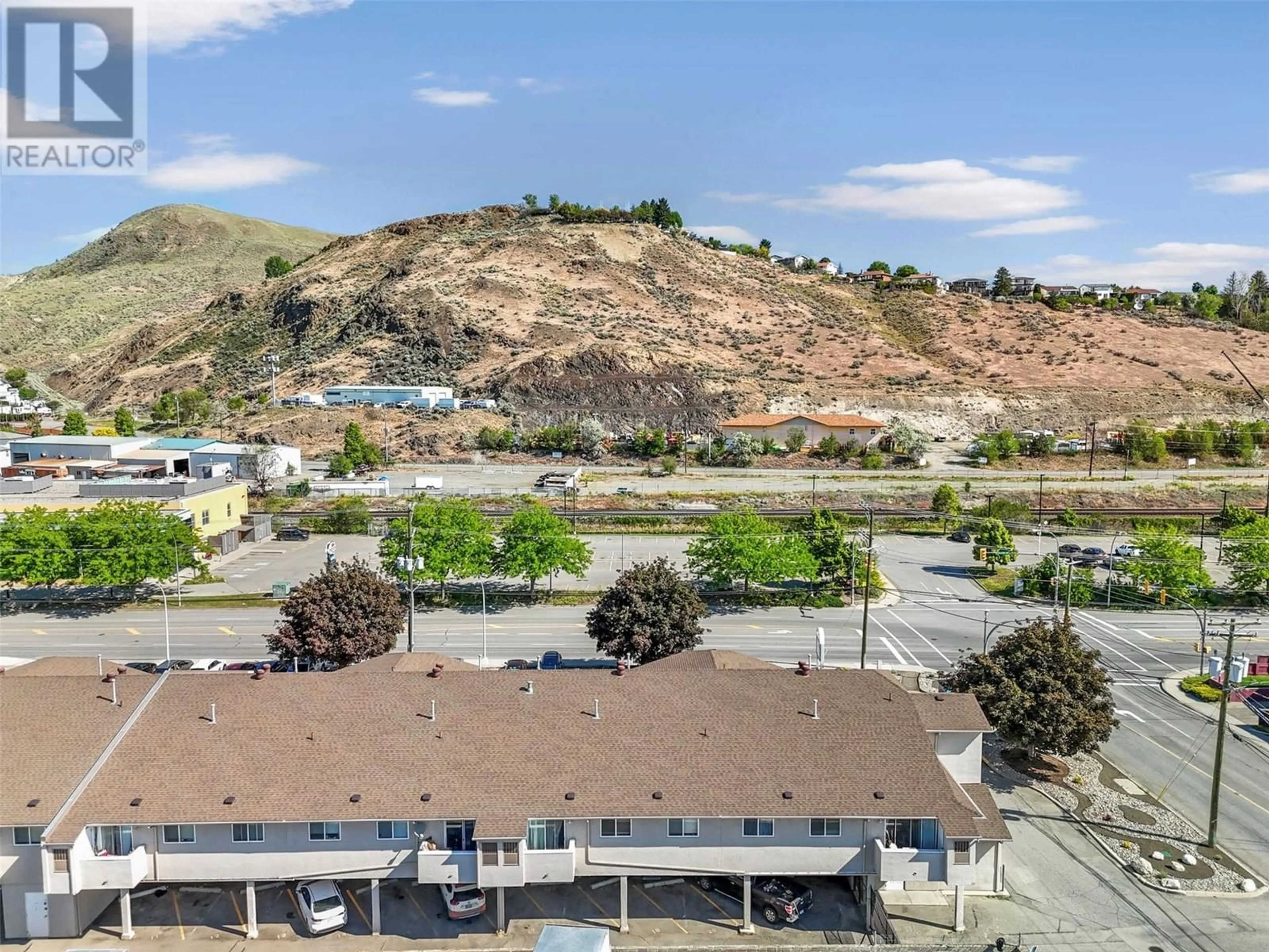 A pic from outside/outdoor area/front of a property/back of a property/a pic from drone, mountain view for 205 - 1295 12TH STREET, Kamloops British Columbia V2B3C8