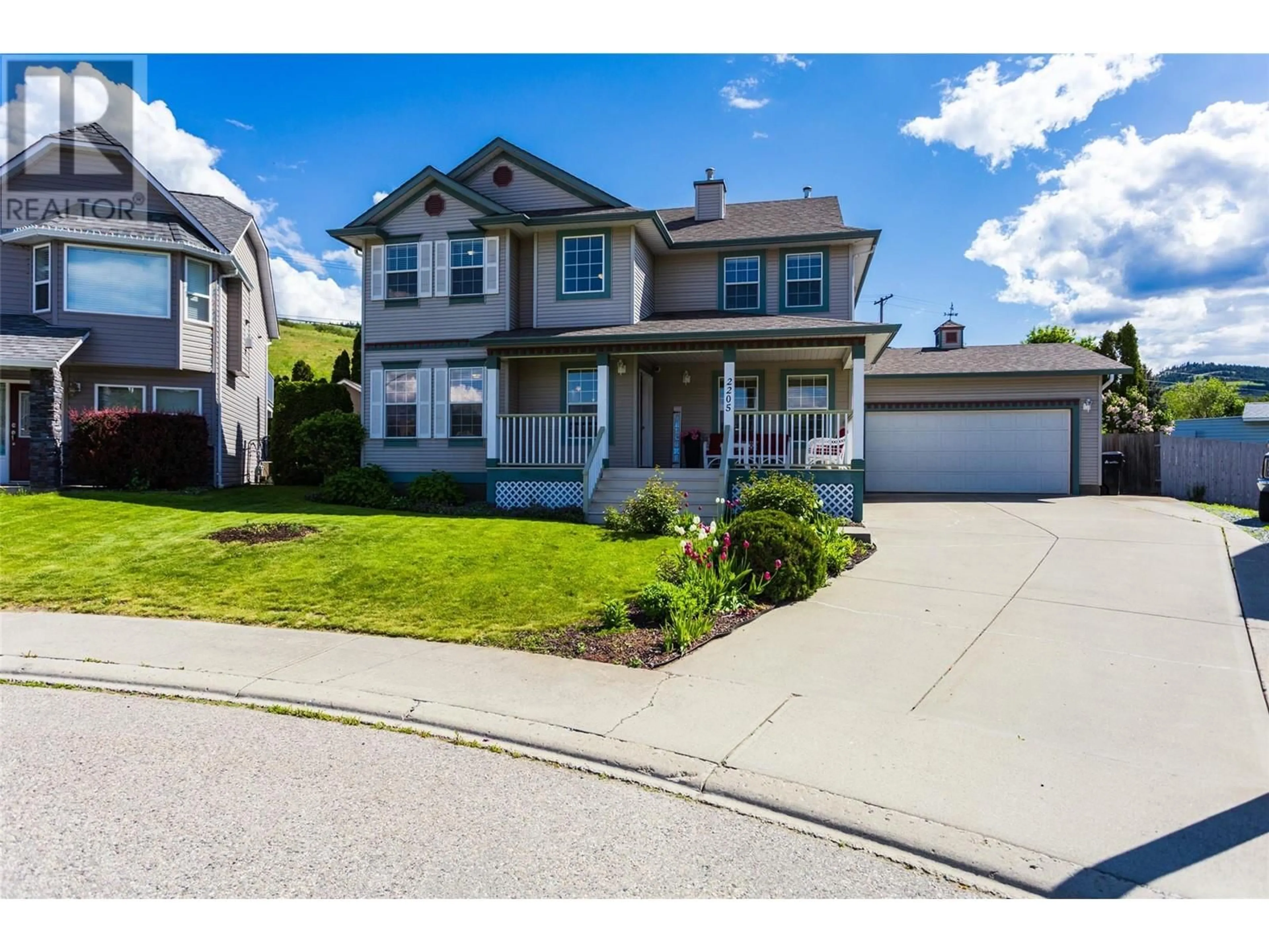 Home with vinyl exterior material, street for 2205 CANARY PLACE, Vernon British Columbia V1H1R3
