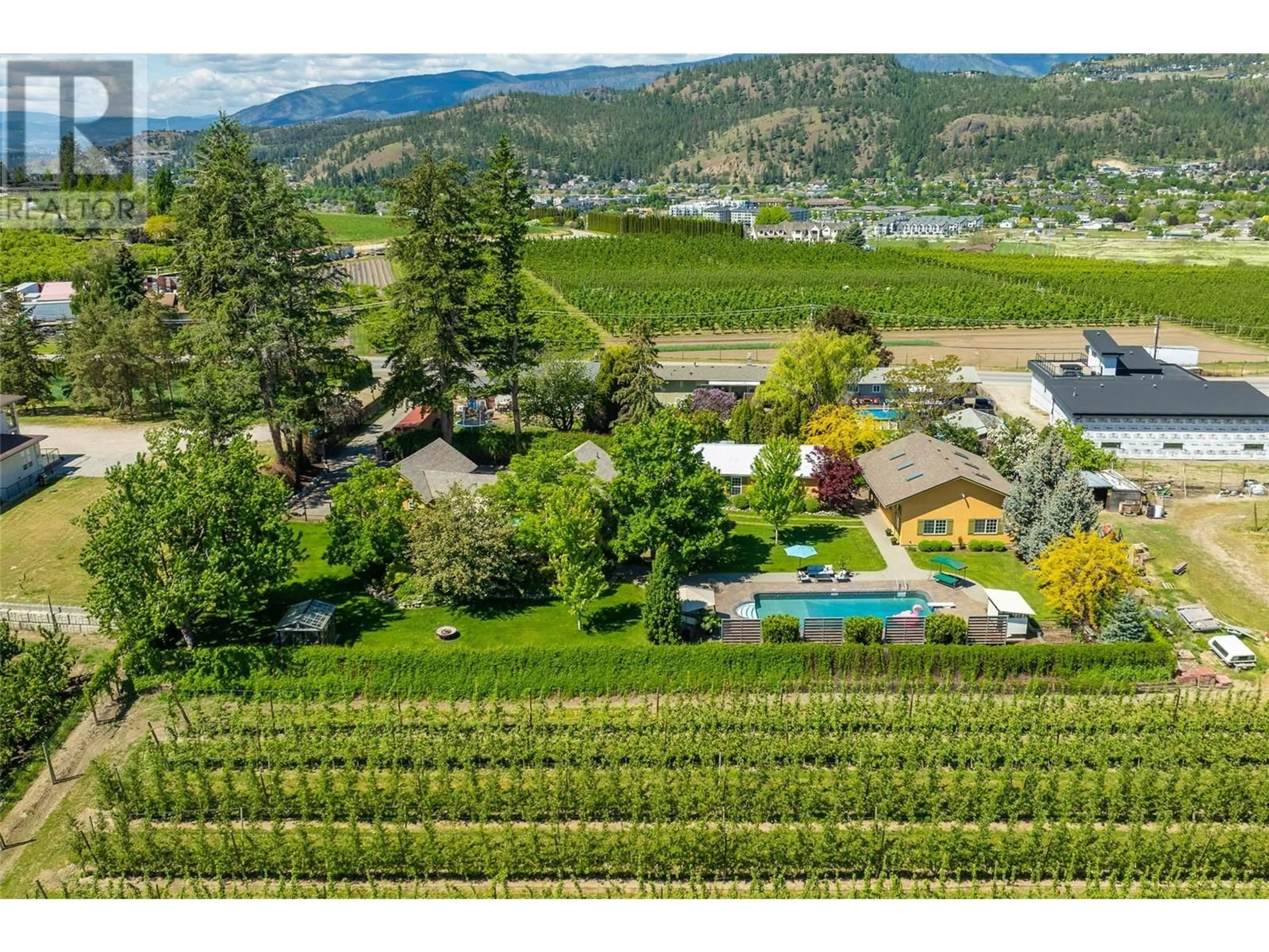 A pic from outside/outdoor area/front of a property/back of a property/a pic from drone, mountain view for 2430 LONGHILL ROAD, Kelowna British Columbia V1V2G3