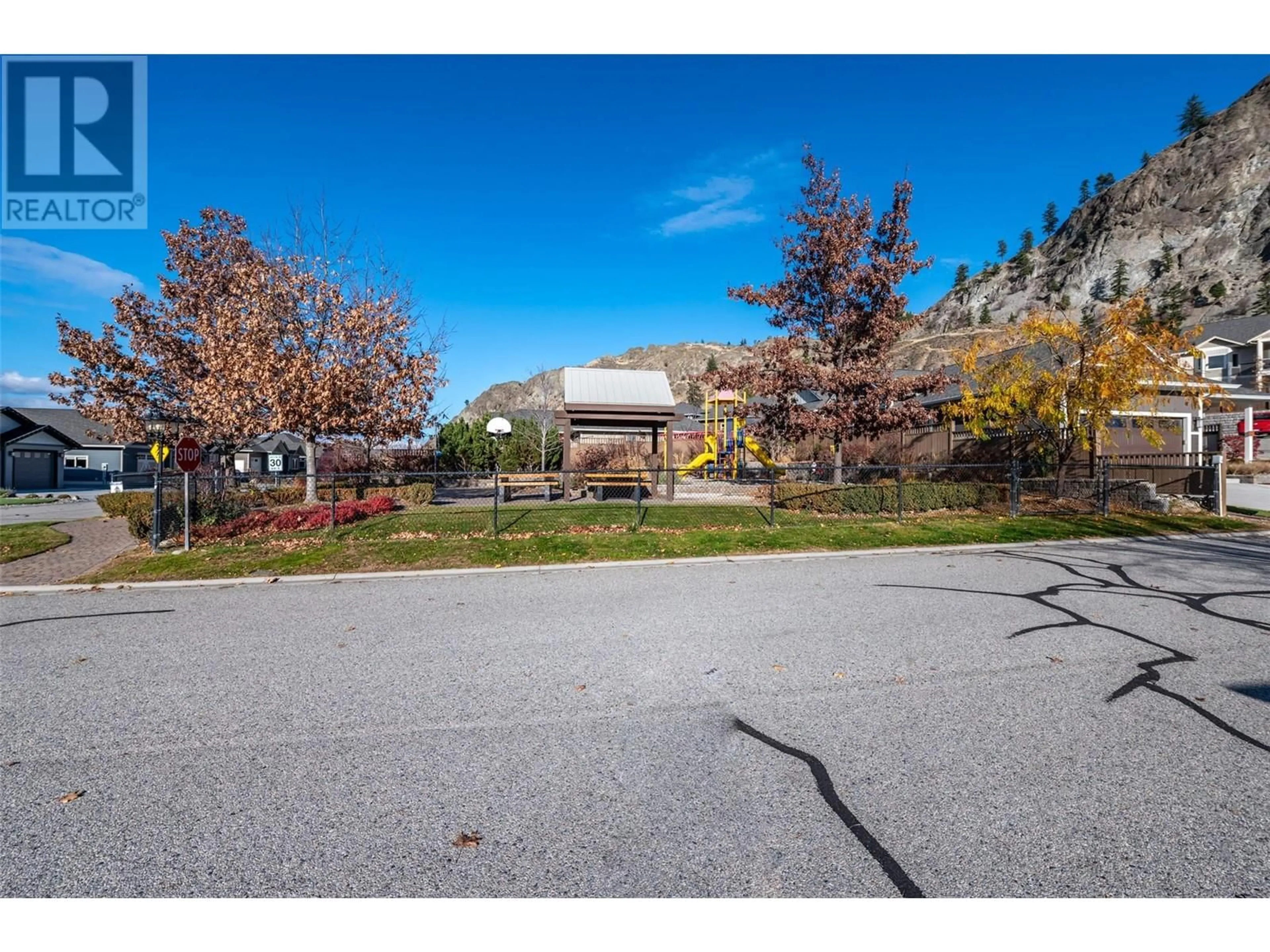 A pic from outside/outdoor area/front of a property/back of a property/a pic from drone, street for 301 - 4400 MCLEAN CREEK ROAD, Okanagan Falls British Columbia V0H1R6