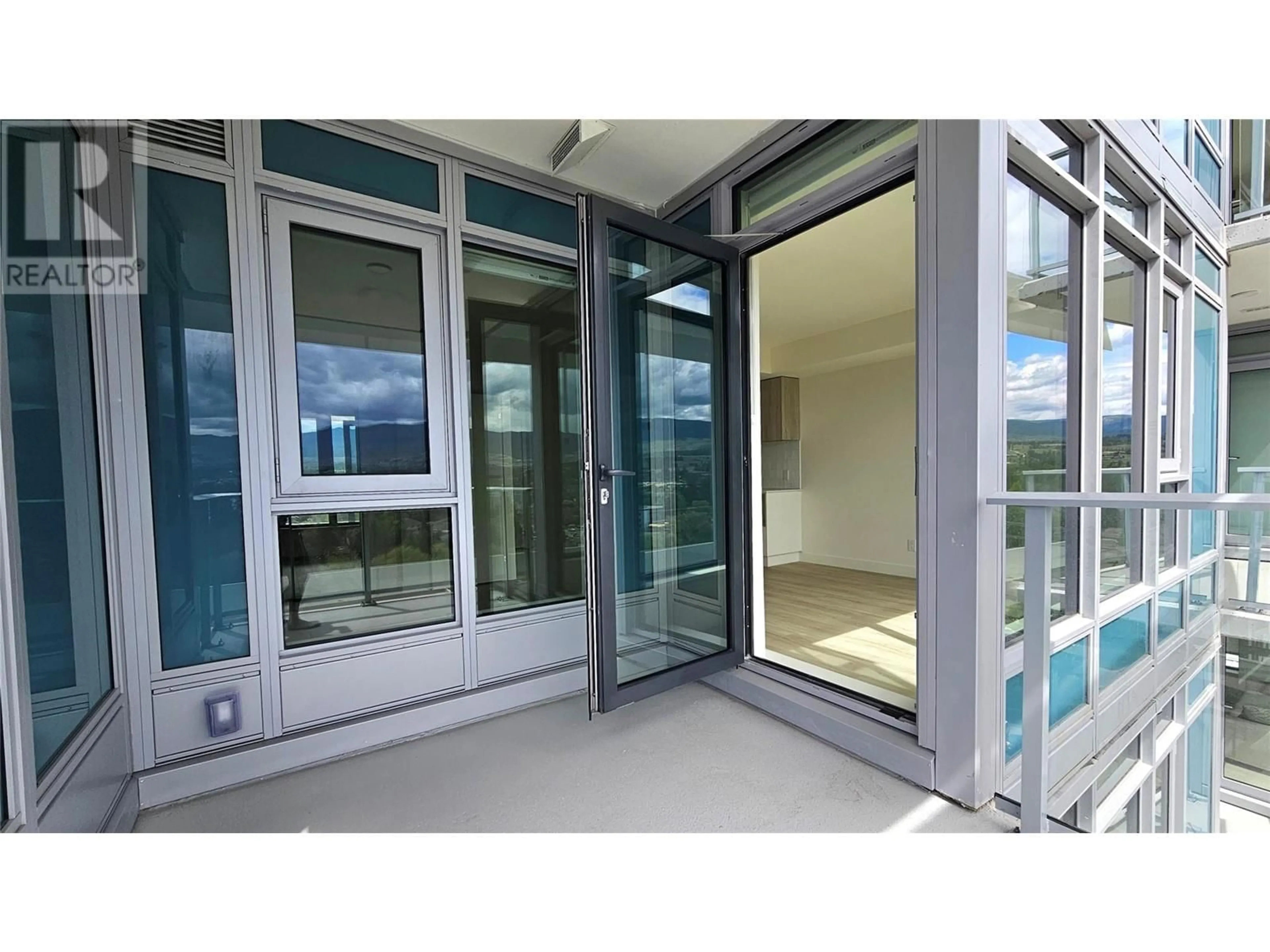 Indoor foyer for 1105 - 3699 CAPOZZI ROAD, Kelowna British Columbia V1W3L2