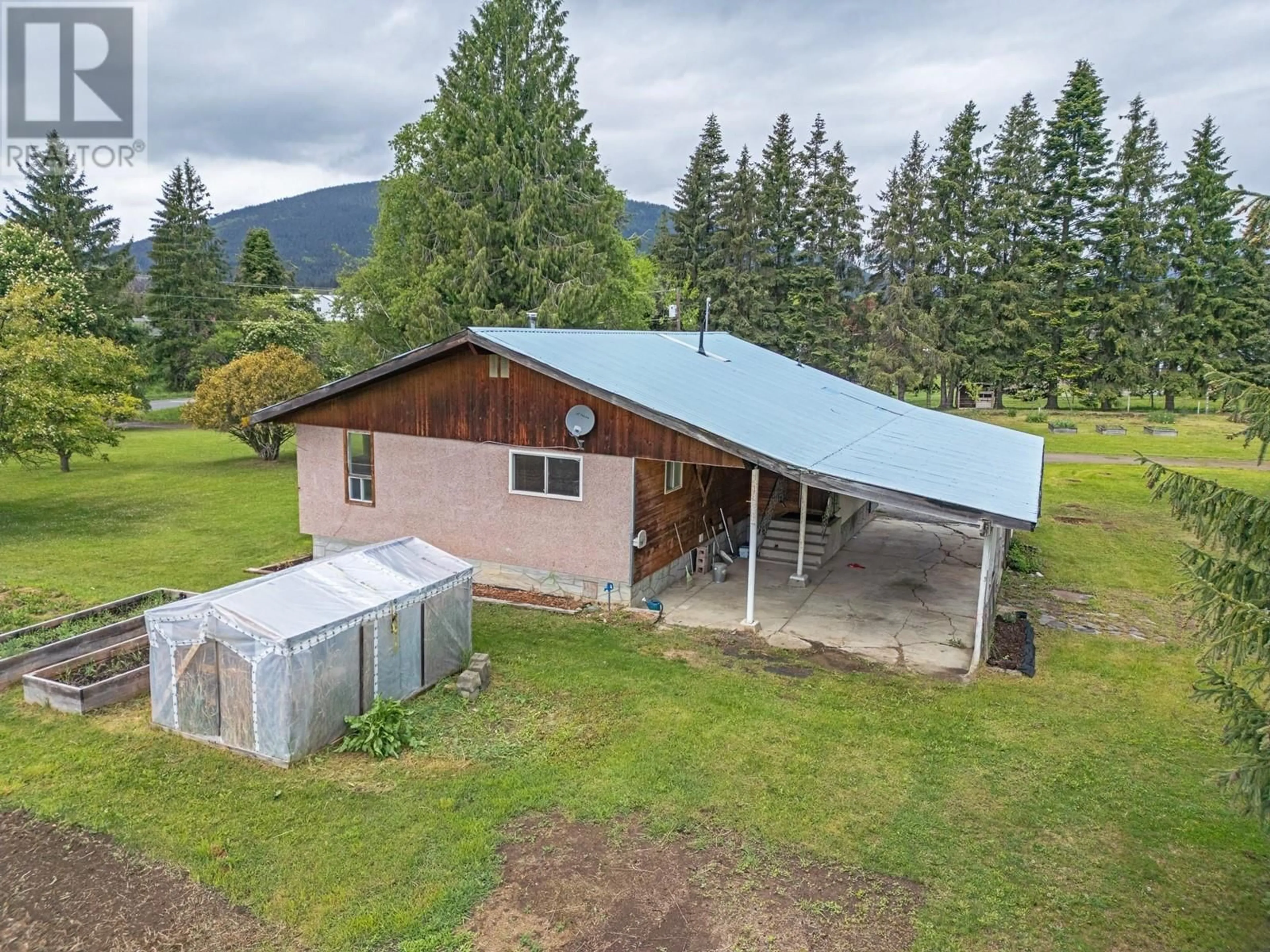 A pic from outside/outdoor area/front of a property/back of a property/a pic from drone, mountain view for 4670 CANYON LISTER ROAD, Canyon British Columbia V0B1C0