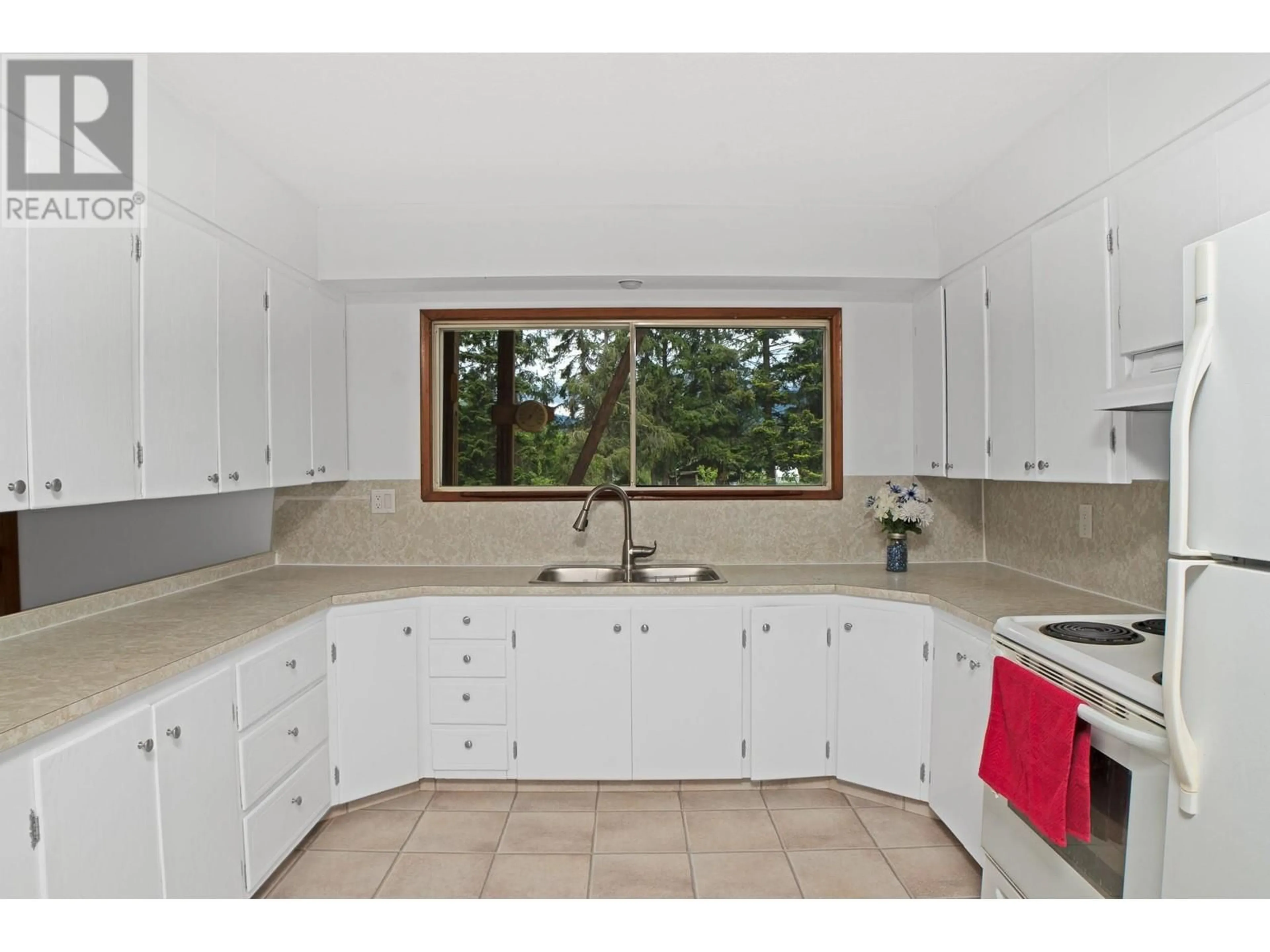 Standard kitchen, ceramic/tile floor for 4670 CANYON LISTER ROAD, Canyon British Columbia V0B1C0