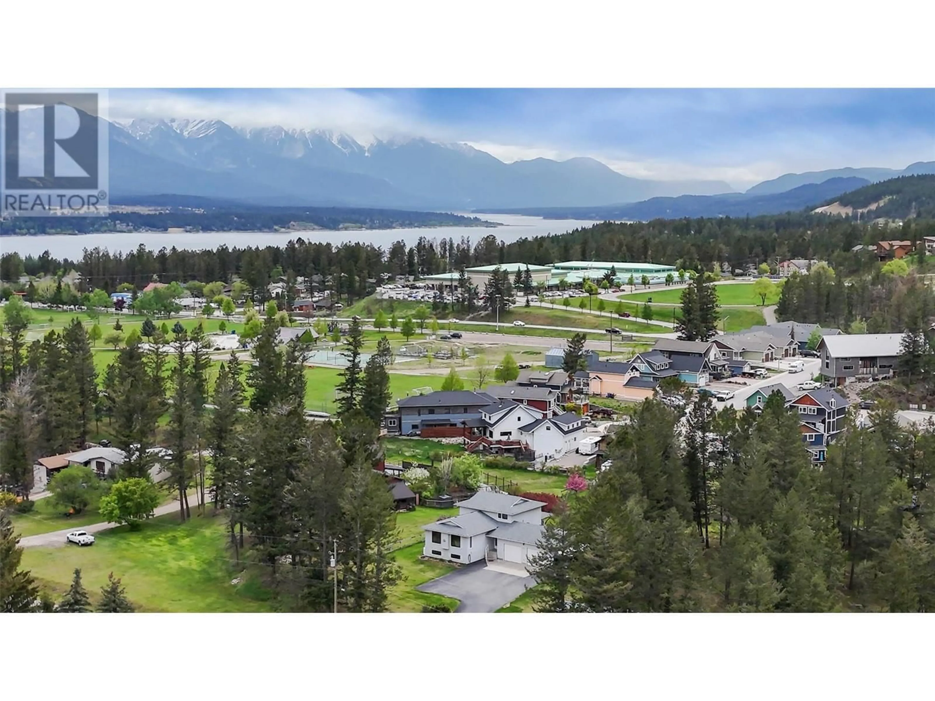 A pic from outside/outdoor area/front of a property/back of a property/a pic from drone, mountain view for 1573 10 STREET, Invermere British Columbia V0A1K4