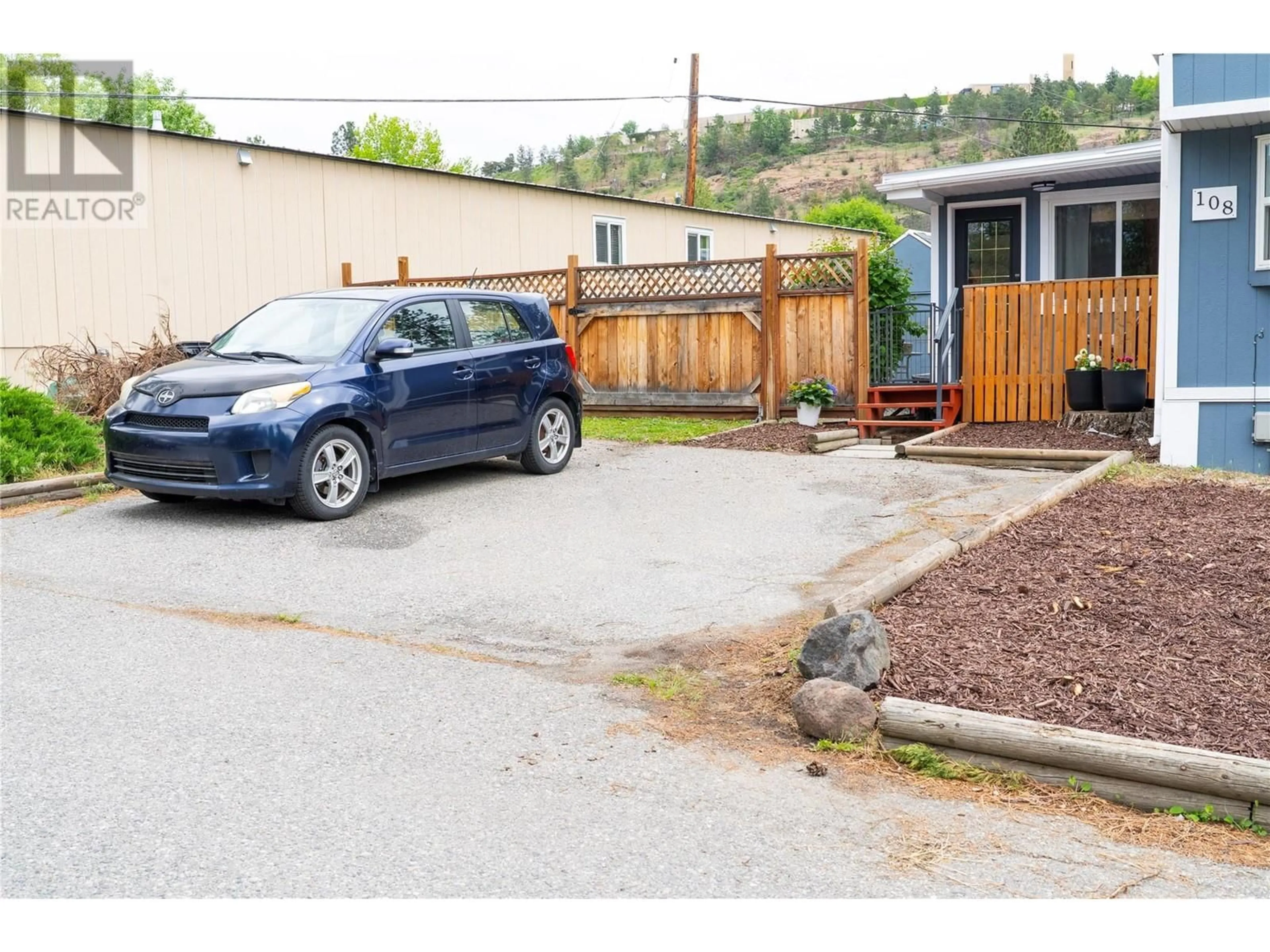 A pic from outside/outdoor area/front of a property/back of a property/a pic from drone, street for 108 - 1860 BOUCHERIE ROAD, Westbank British Columbia V4T2A3