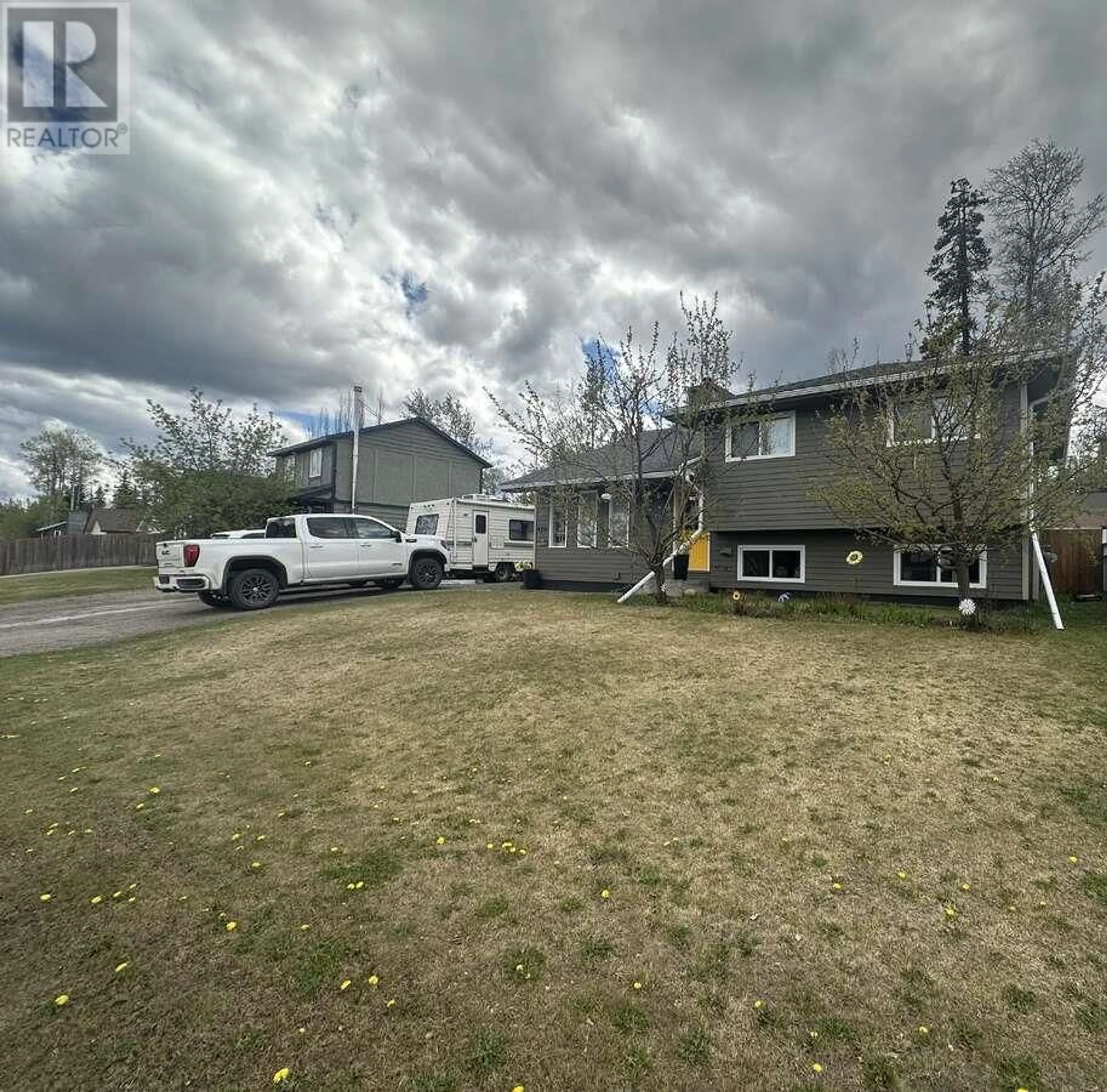 A pic from outside/outdoor area/front of a property/back of a property/a pic from drone, street for 120 BERGERON DRIVE, Tumbler Ridge British Columbia V0C2W0