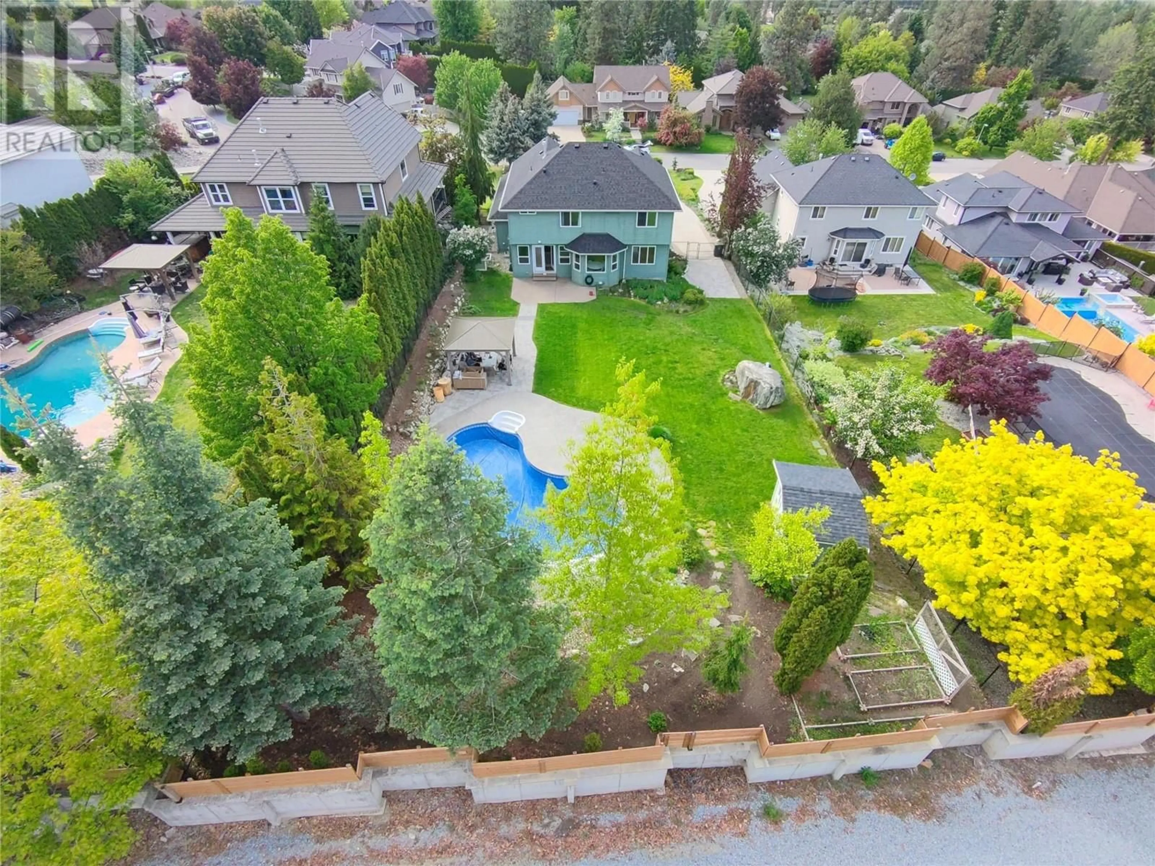 A pic from outside/outdoor area/front of a property/back of a property/a pic from drone, street for 4849 CANYON RIDGE CRESCENT, Kelowna British Columbia V1W4A2