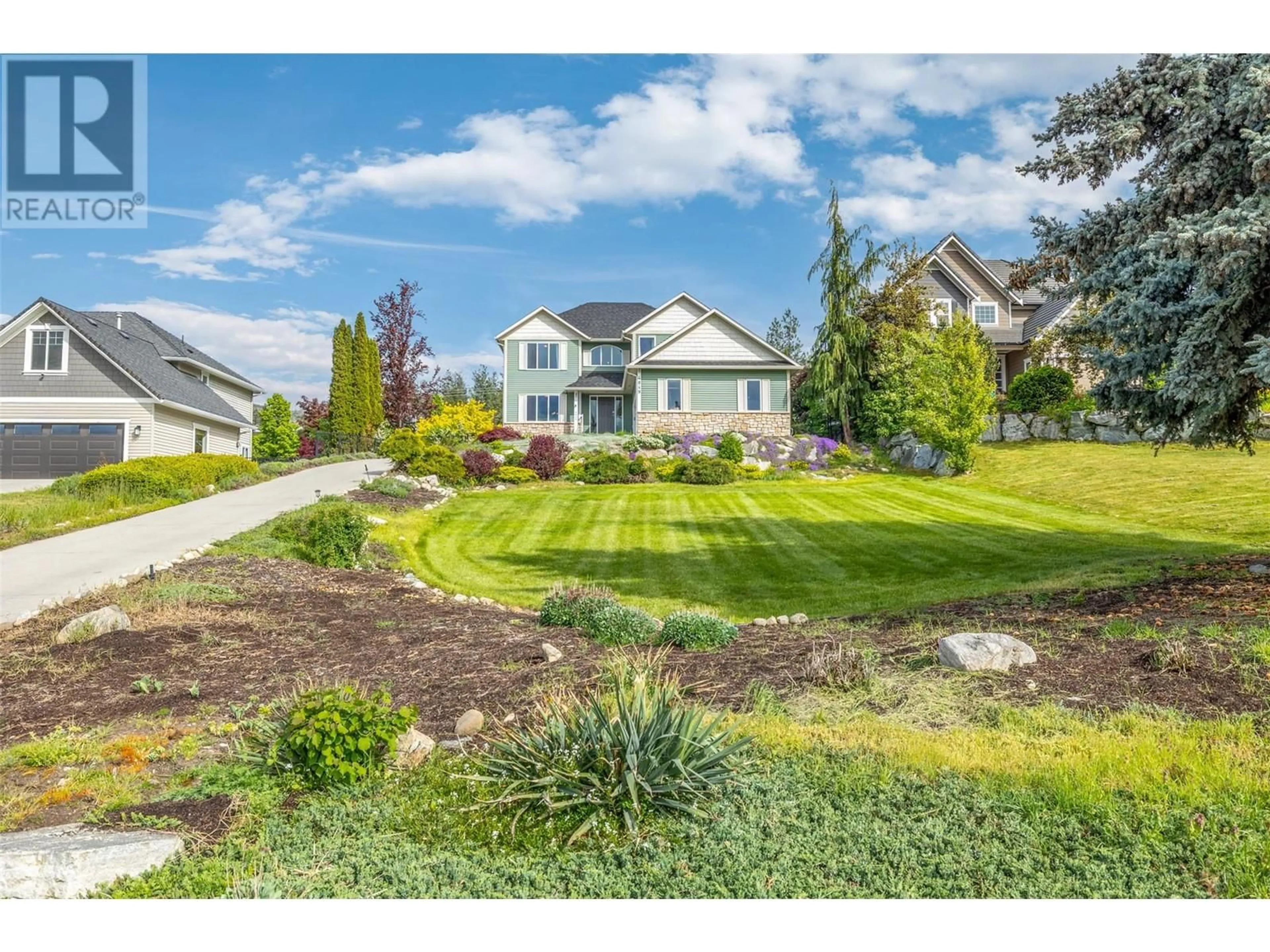 A pic from outside/outdoor area/front of a property/back of a property/a pic from drone, street for 4849 CANYON RIDGE CRESCENT, Kelowna British Columbia V1W4A2