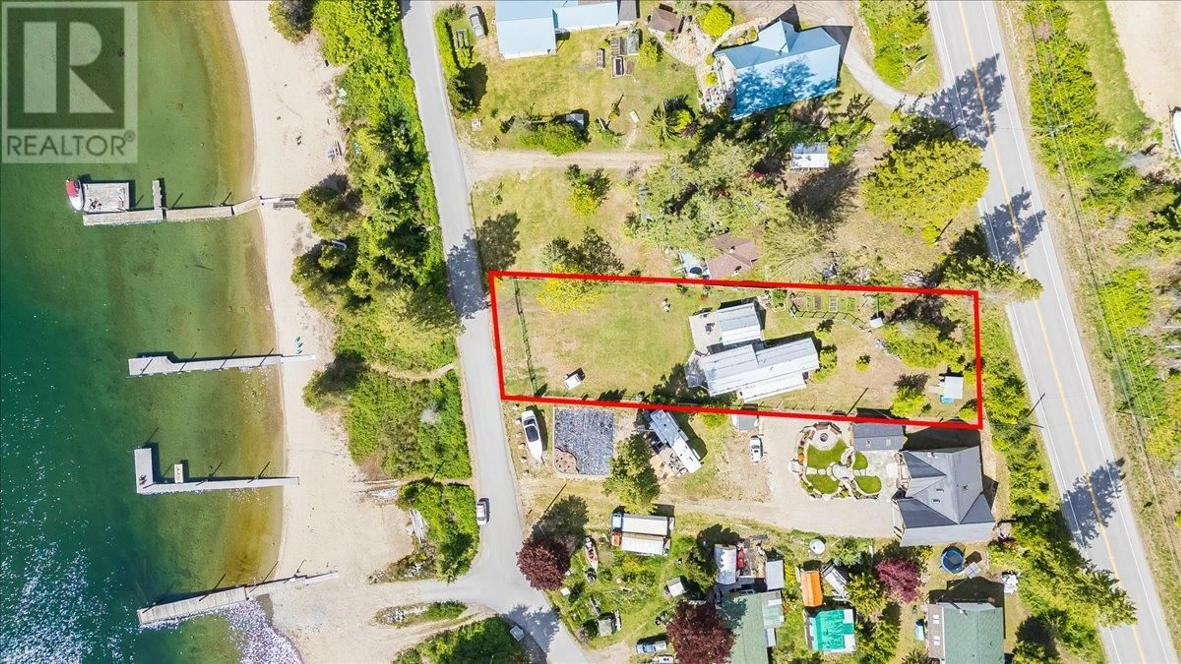 A pic from outside/outdoor area/front of a property/back of a property/a pic from drone, street for 7733 BALFOUR WHARF ROAD, Balfour British Columbia V0G1C0