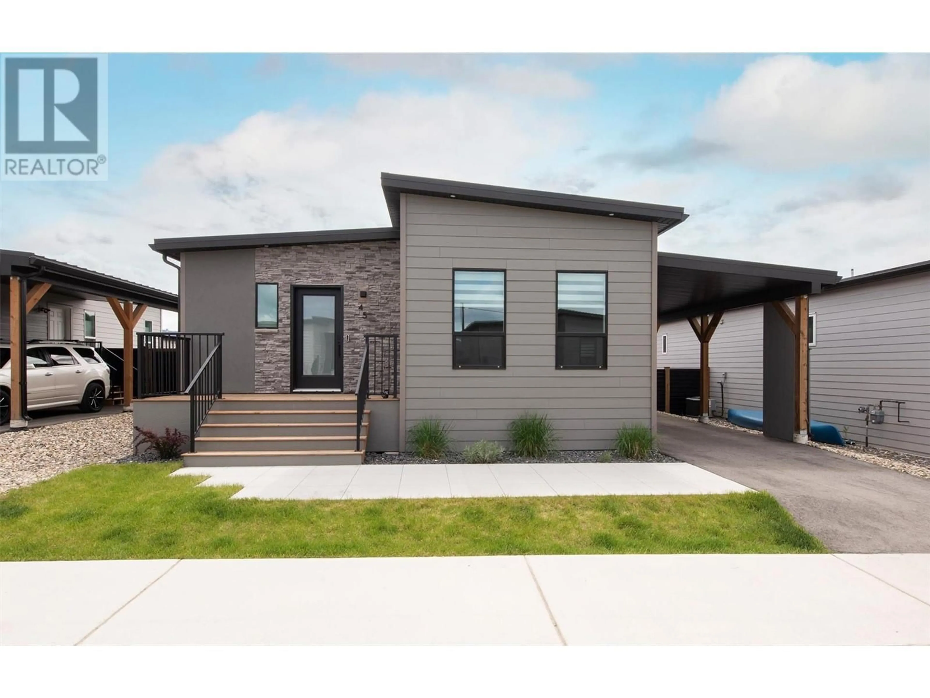 Home with vinyl exterior material, street for 45 - 8900 JIM BAILEY ROAD, Kelowna British Columbia V4V0B5