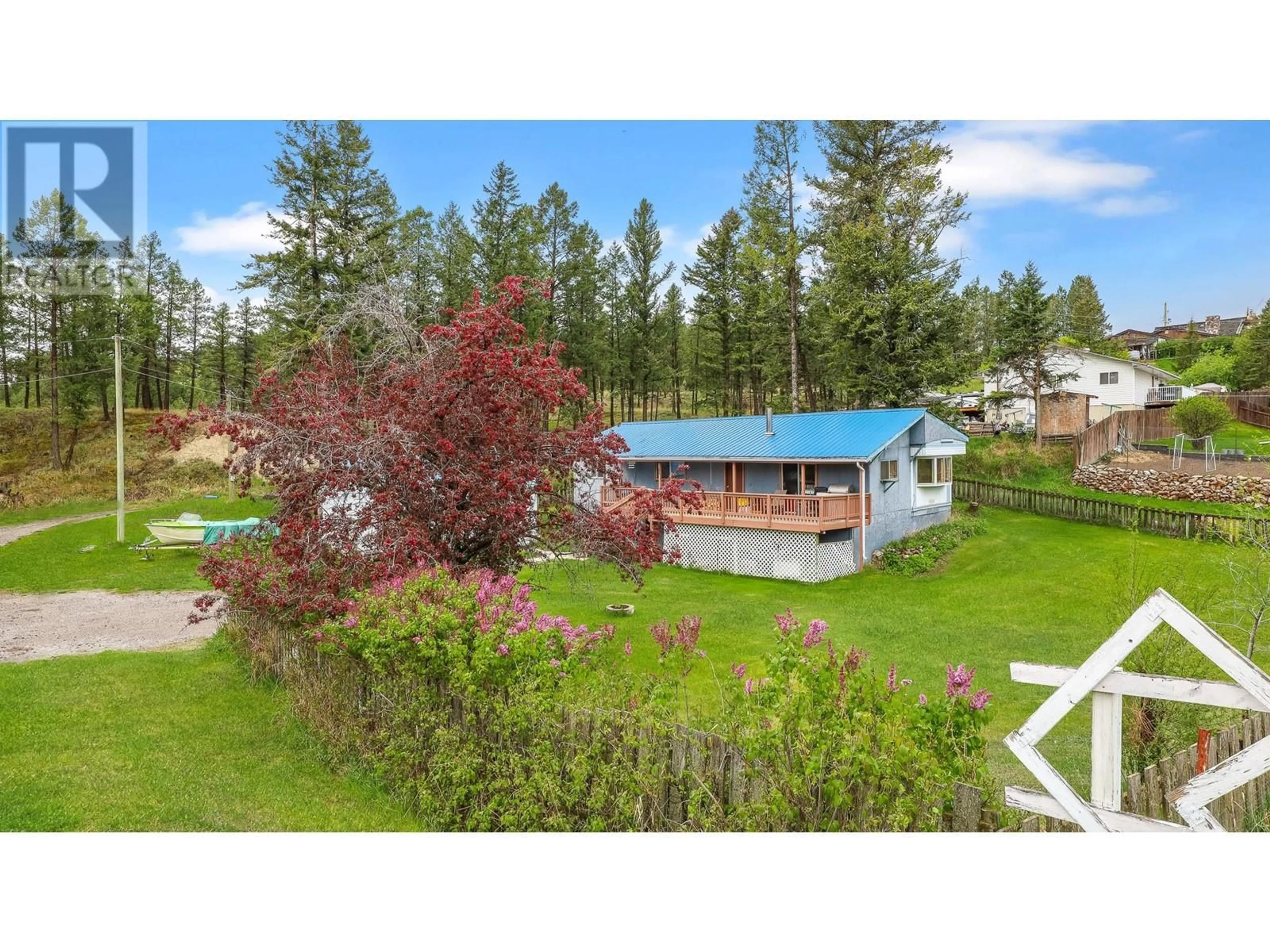 A pic from outside/outdoor area/front of a property/back of a property/a pic from drone, mountain view for 9185 FAIRVIEW AVENUE, Wilmer British Columbia V0A1K5