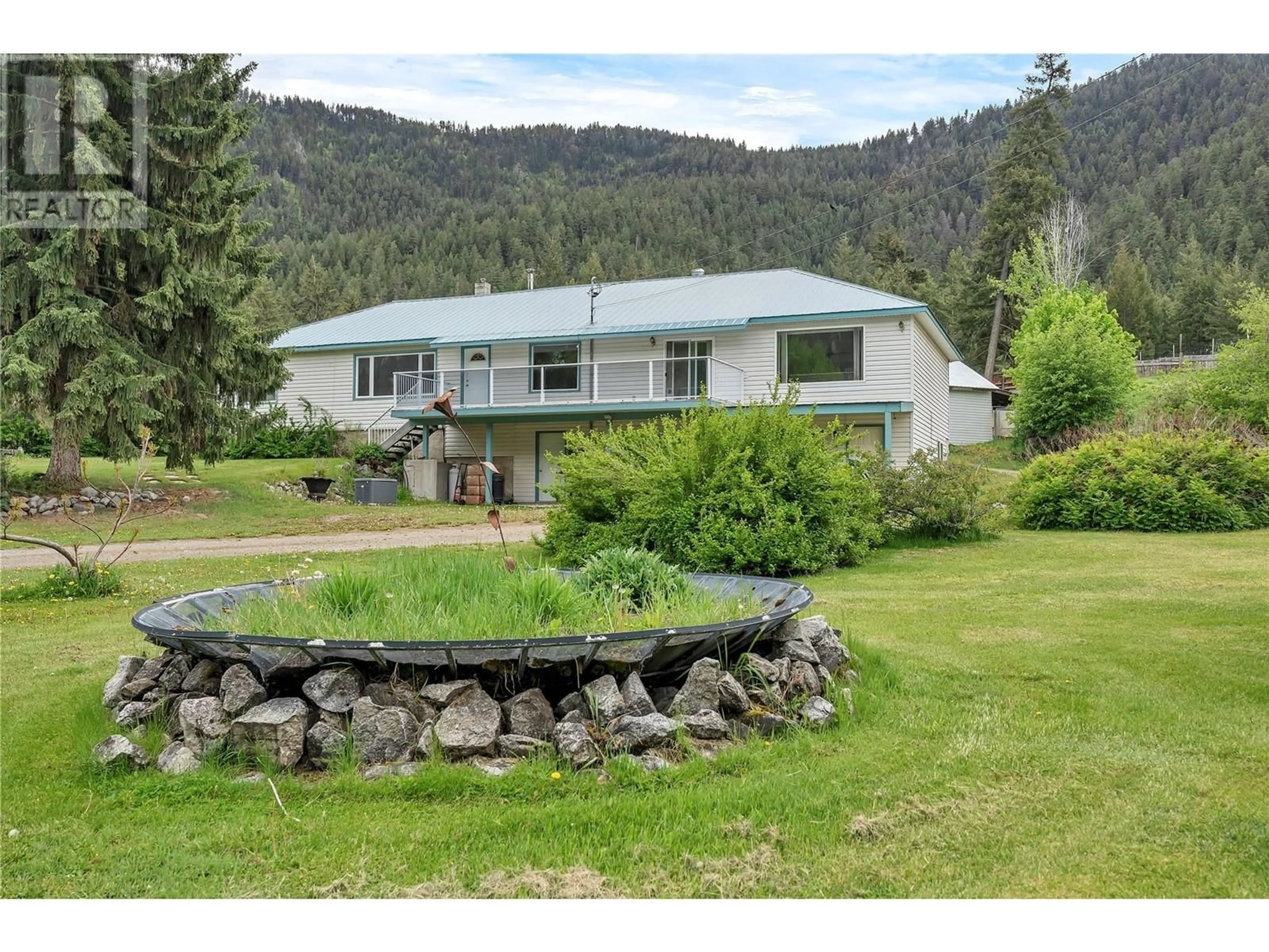 A pic from outside/outdoor area/front of a property/back of a property/a pic from drone, mountain view for 1167 HIGHWAY 3 OTHER, Princeton British Columbia V0X1W0