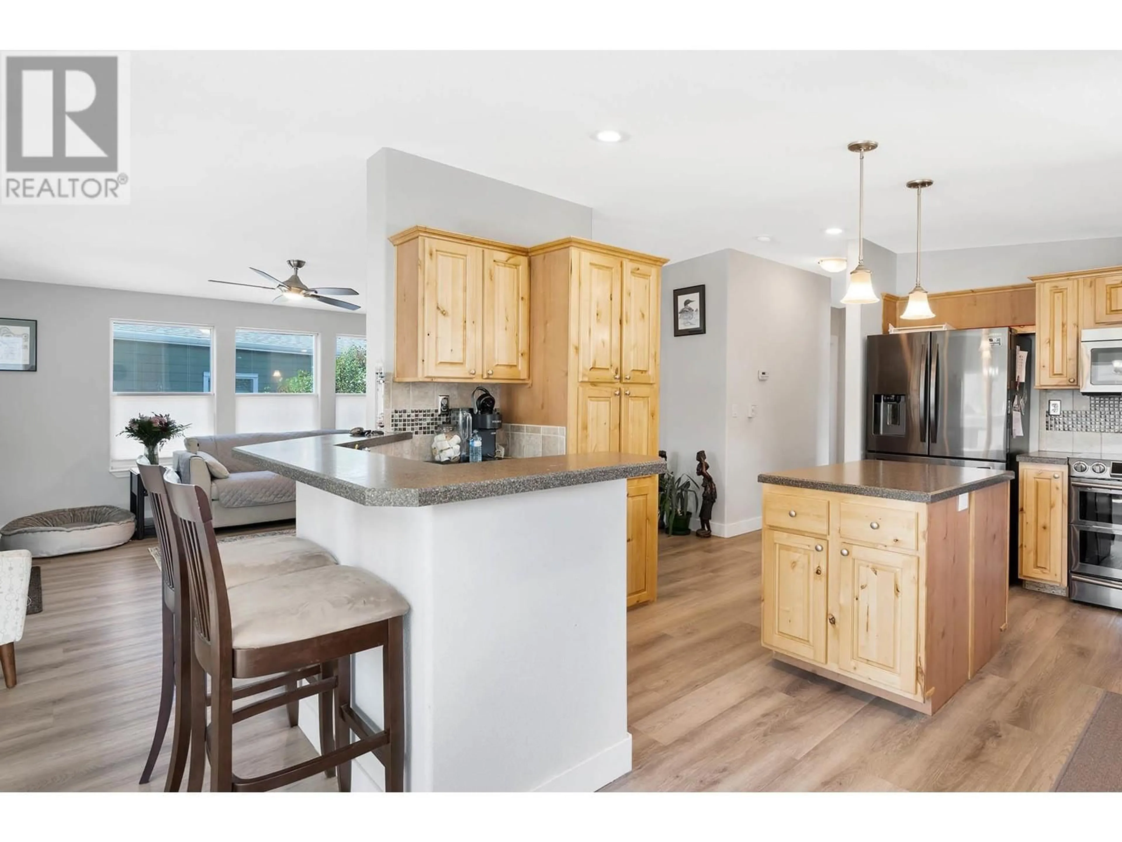 Open concept kitchen, wood/laminate floor for 5 - 1030 RICARDO ROAD, Kamloops British Columbia V2H0C7