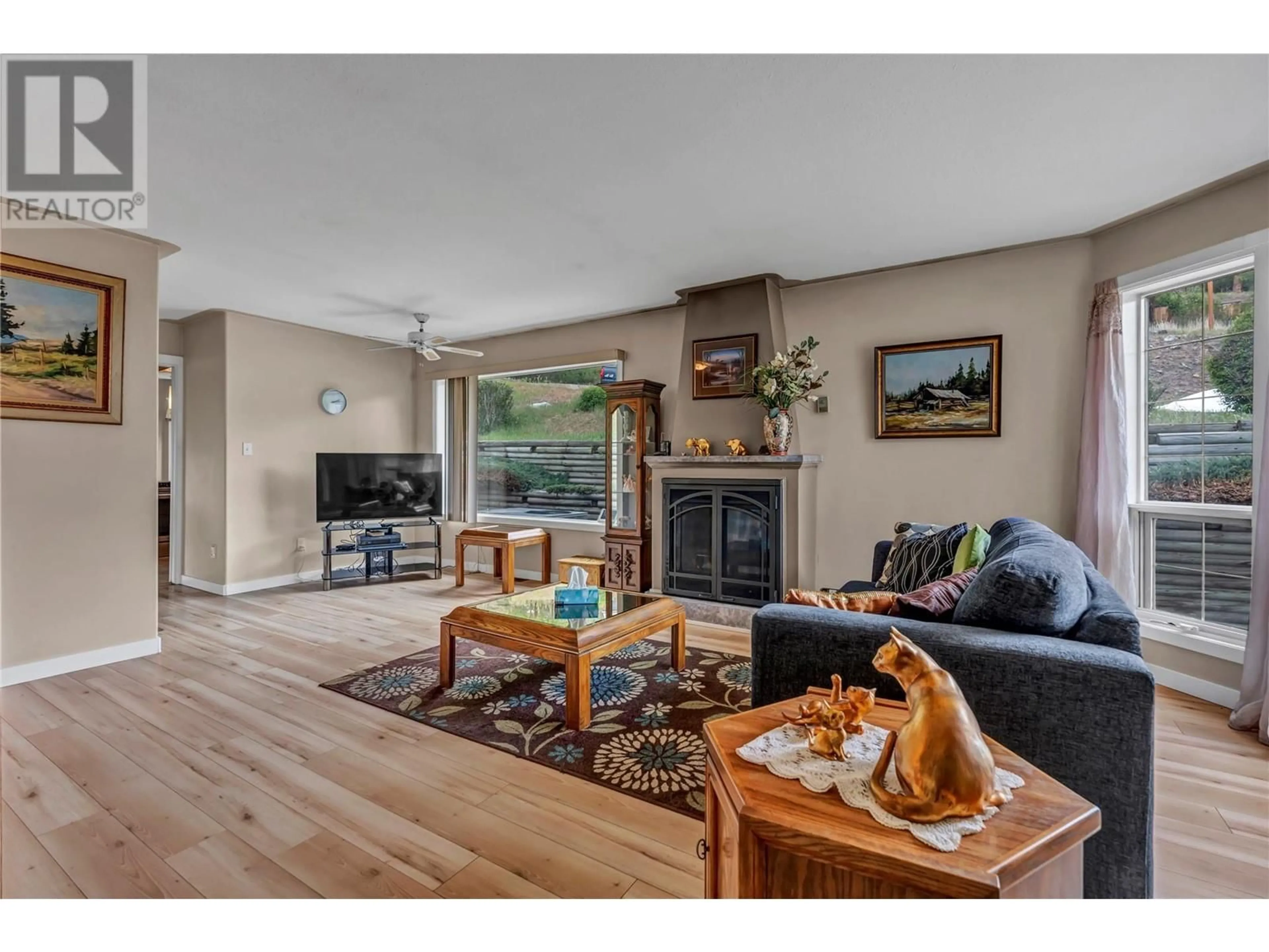 Living room with furniture, wood/laminate floor for B - 105 BRANDLMAYR OTHER, Princeton British Columbia V0X1W0
