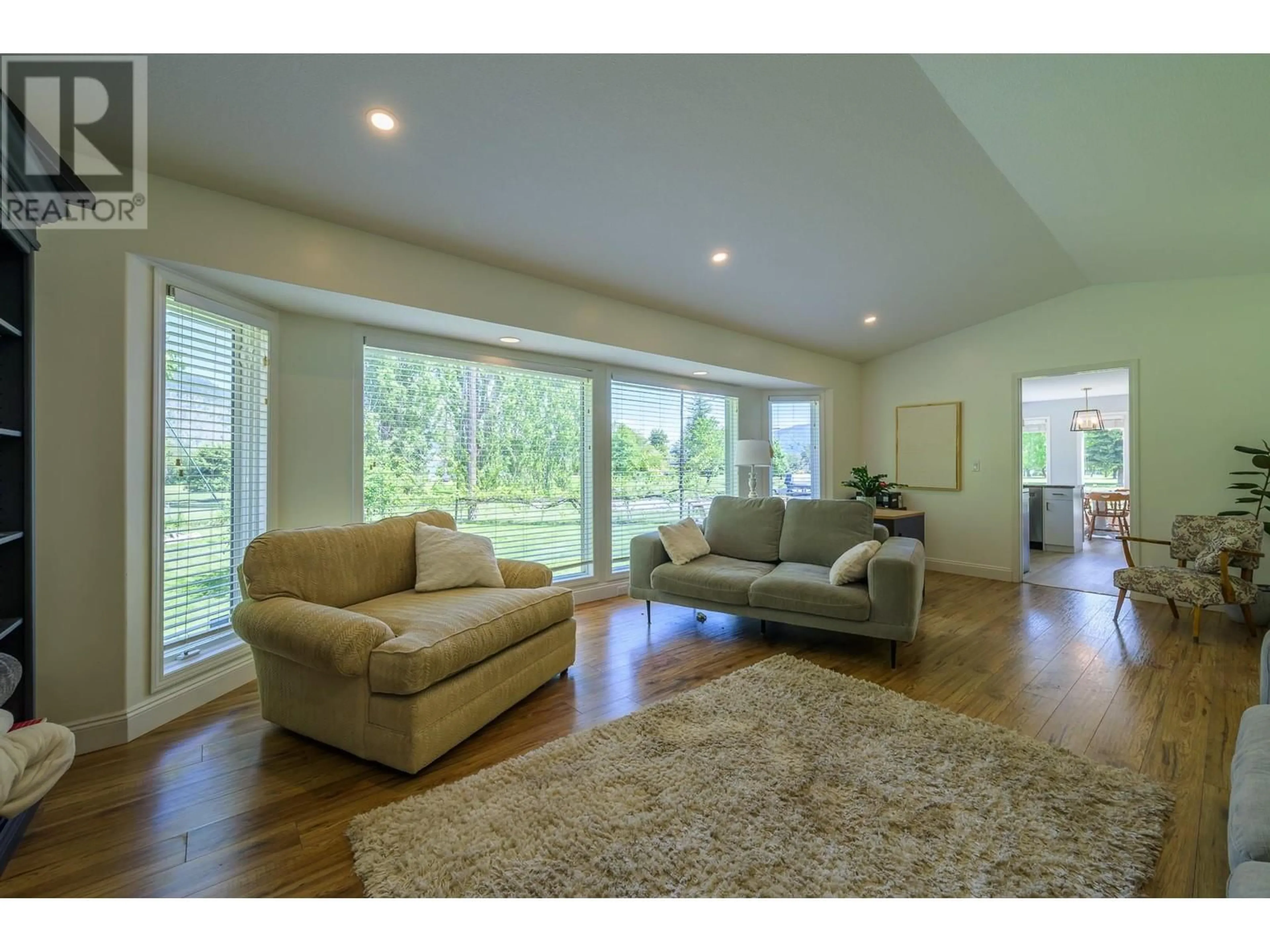 Living room with furniture, wood/laminate floor for 335 ASPEN DRIVE, Chase British Columbia V0E1M0