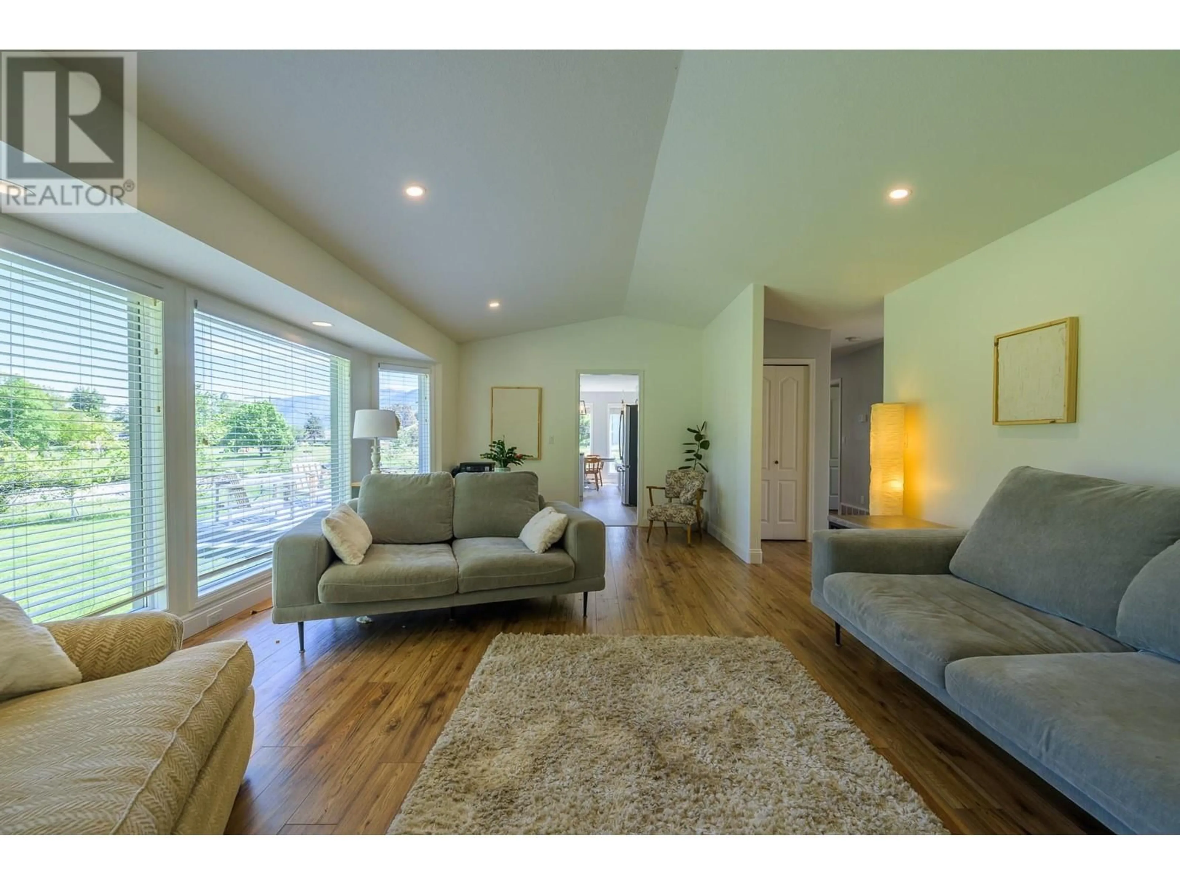 Living room with furniture, wood/laminate floor for 335 ASPEN DRIVE, Chase British Columbia V0E1M0