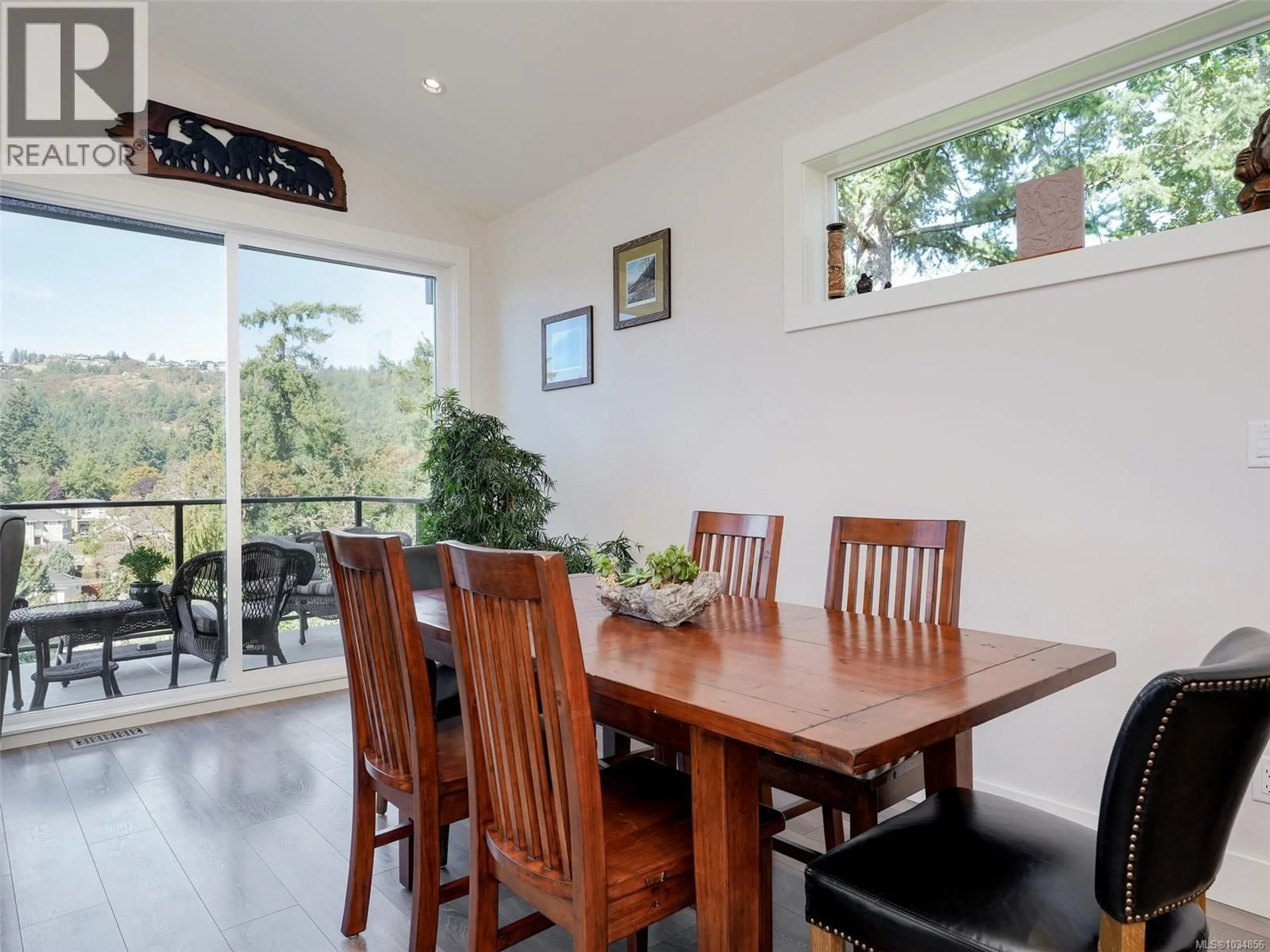 Dining room, wood/laminate floor for 2448 PROSPECTOR WAY, Langford British Columbia V9B5X6