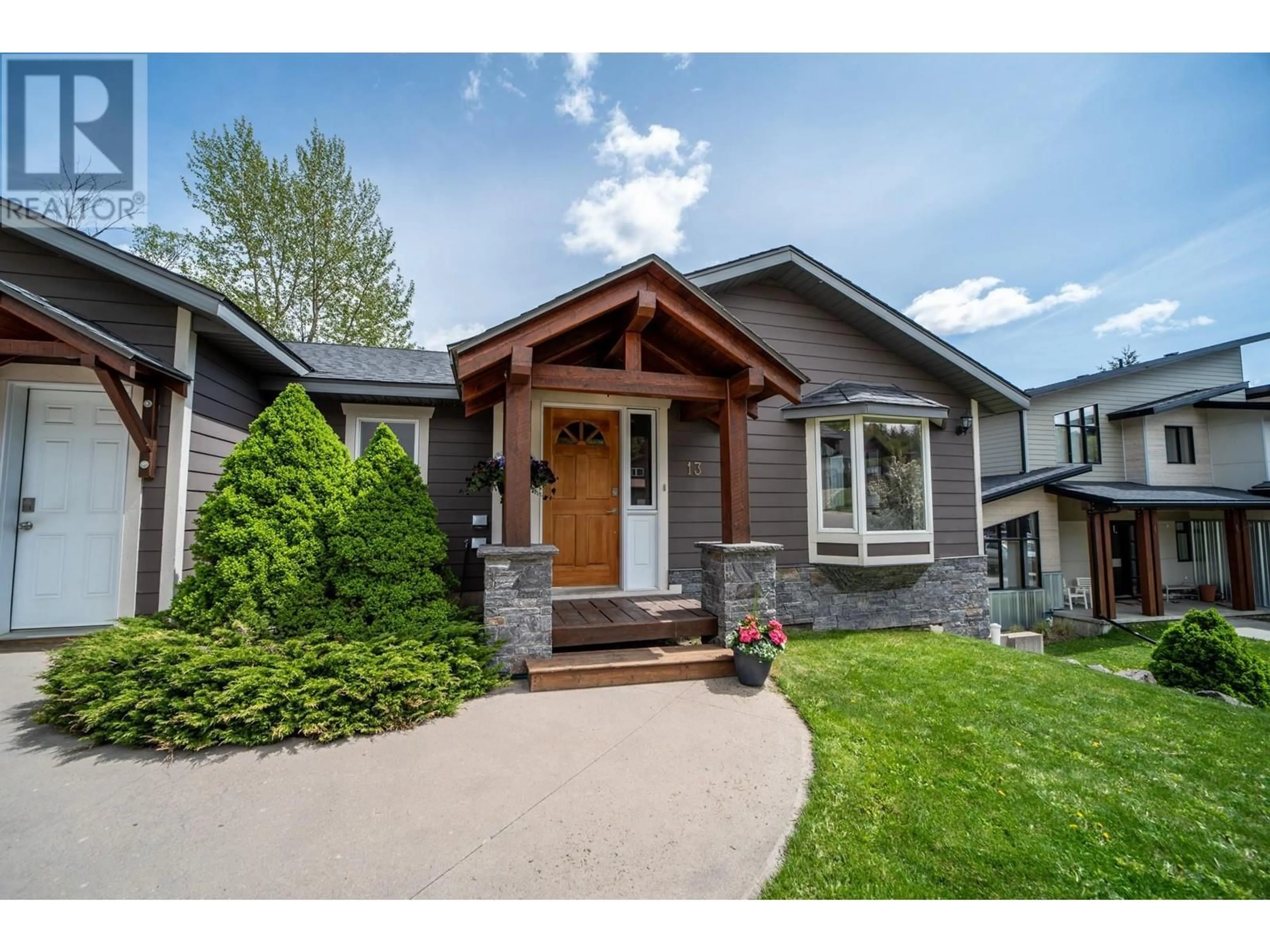 Home with vinyl exterior material, street for 13 ASPEN CRESCENT, Fernie British Columbia V0B1M5