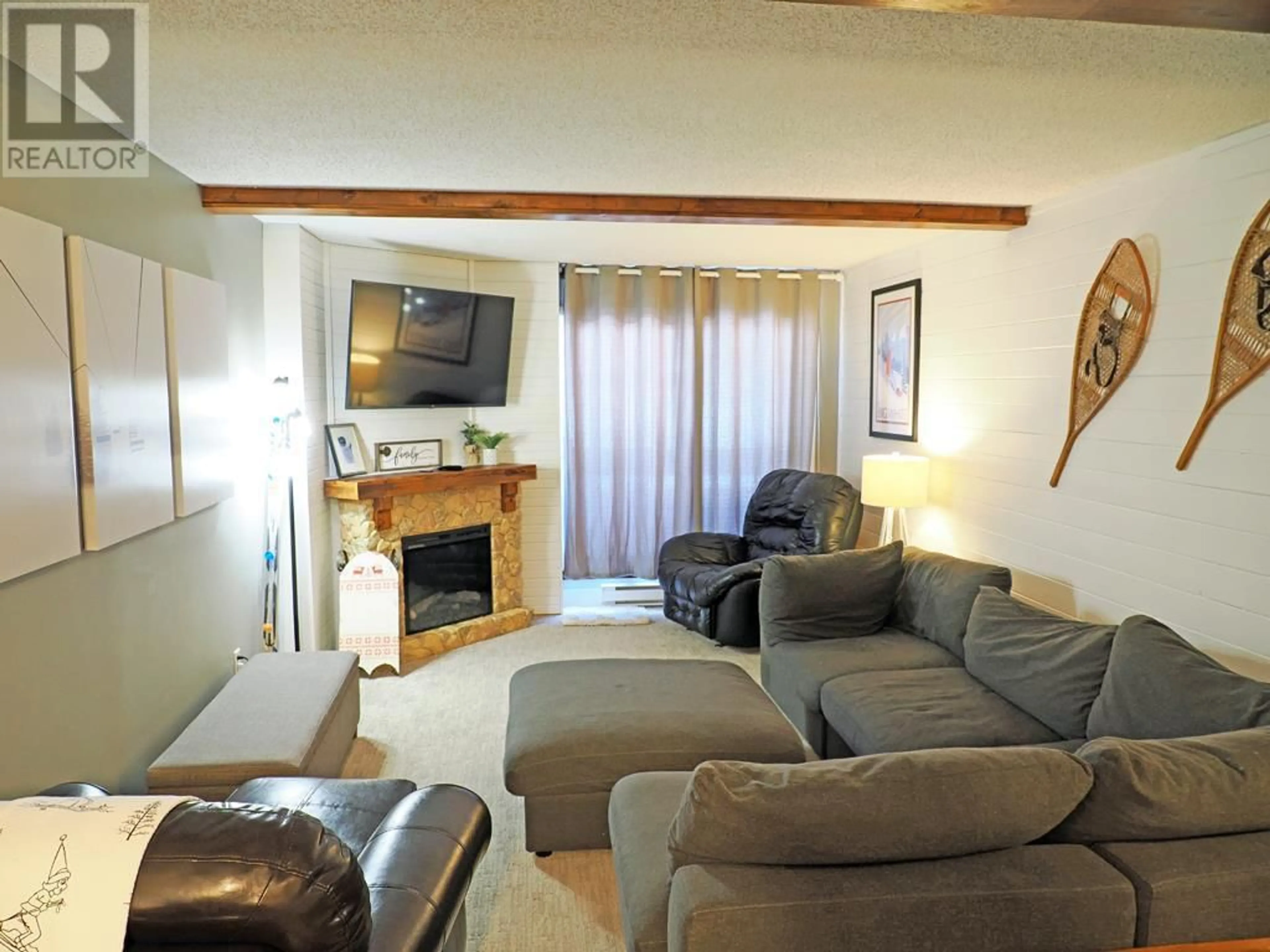 Living room with furniture, unknown for 310 - 6430 WHISKEY JACK ROAD, Big White British Columbia V1P1P3