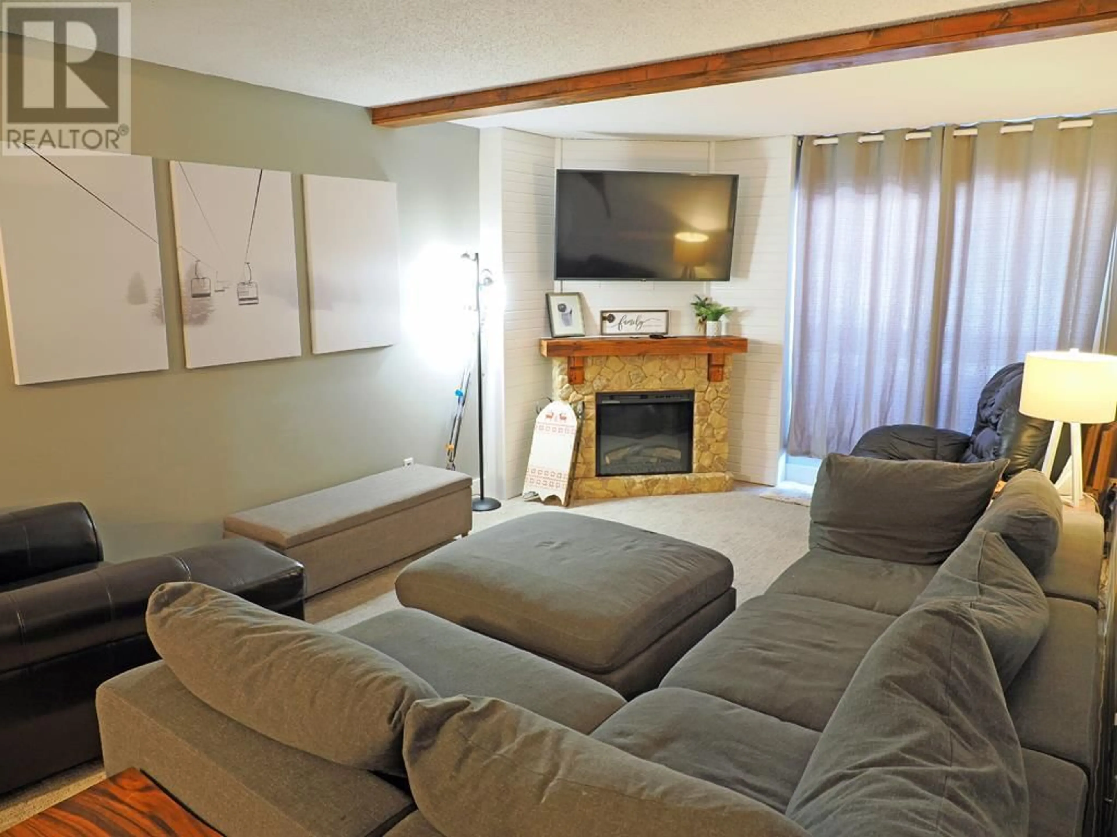 Living room with furniture, unknown for 310 - 6430 WHISKEY JACK ROAD, Big White British Columbia V1P1P3