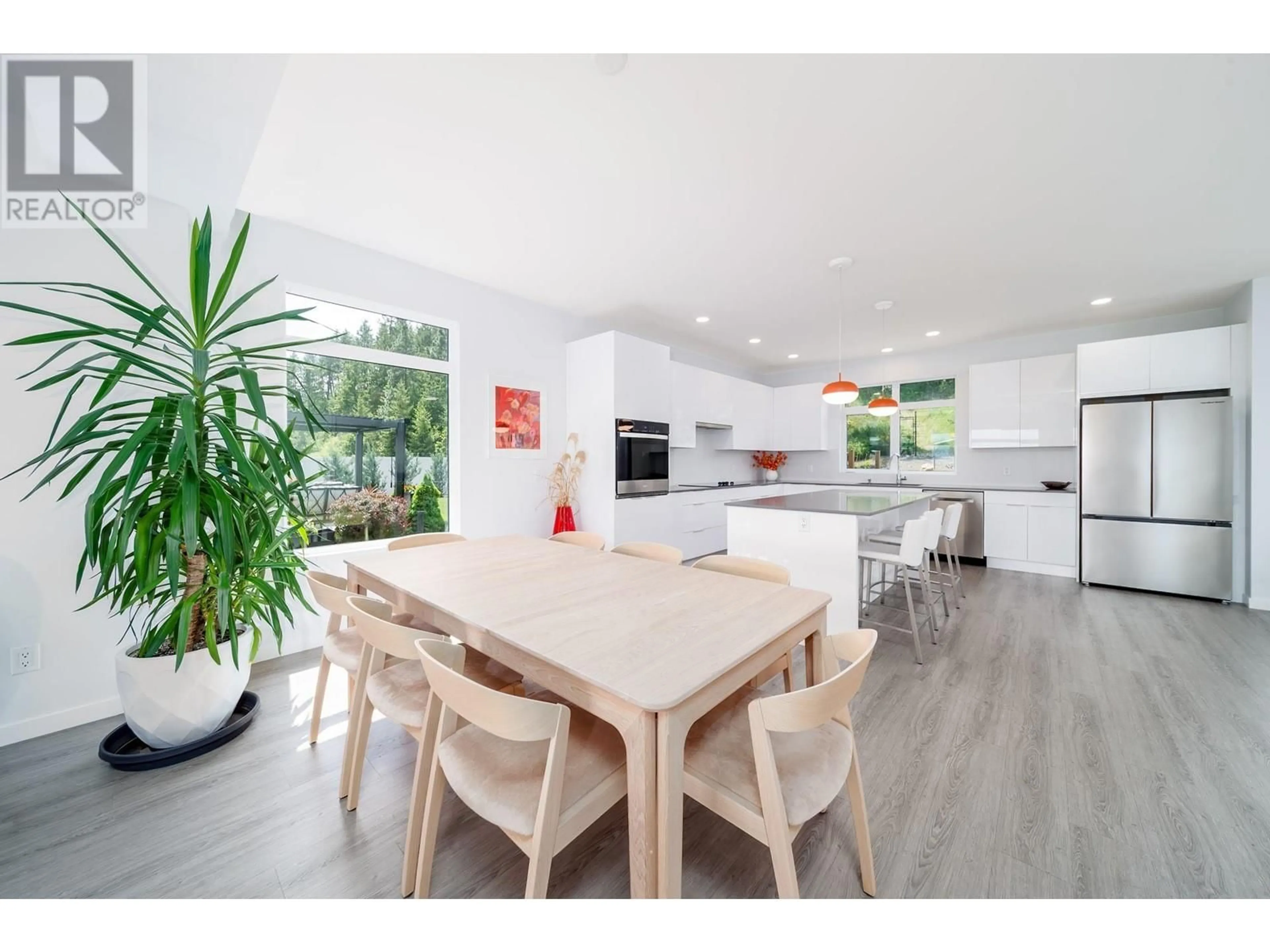 Open concept kitchen, wood/laminate floor for 3702 ASTORIA DRIVE, West Kelowna British Columbia V4T0B1