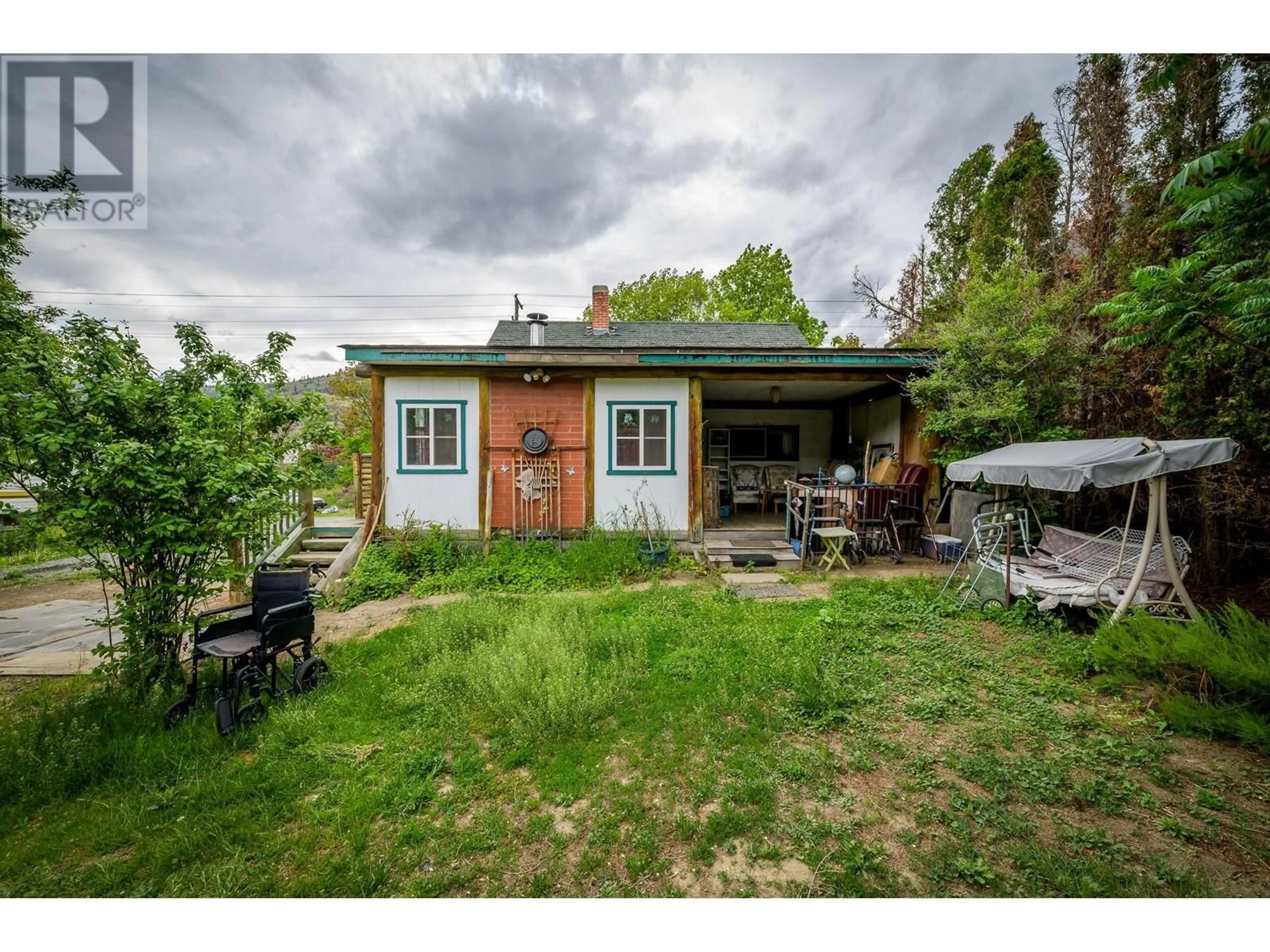 A pic from outside/outdoor area/front of a property/back of a property/a pic from drone, street for 2975 WESTSYDE ROAD, Kamloops British Columbia V2B7E7