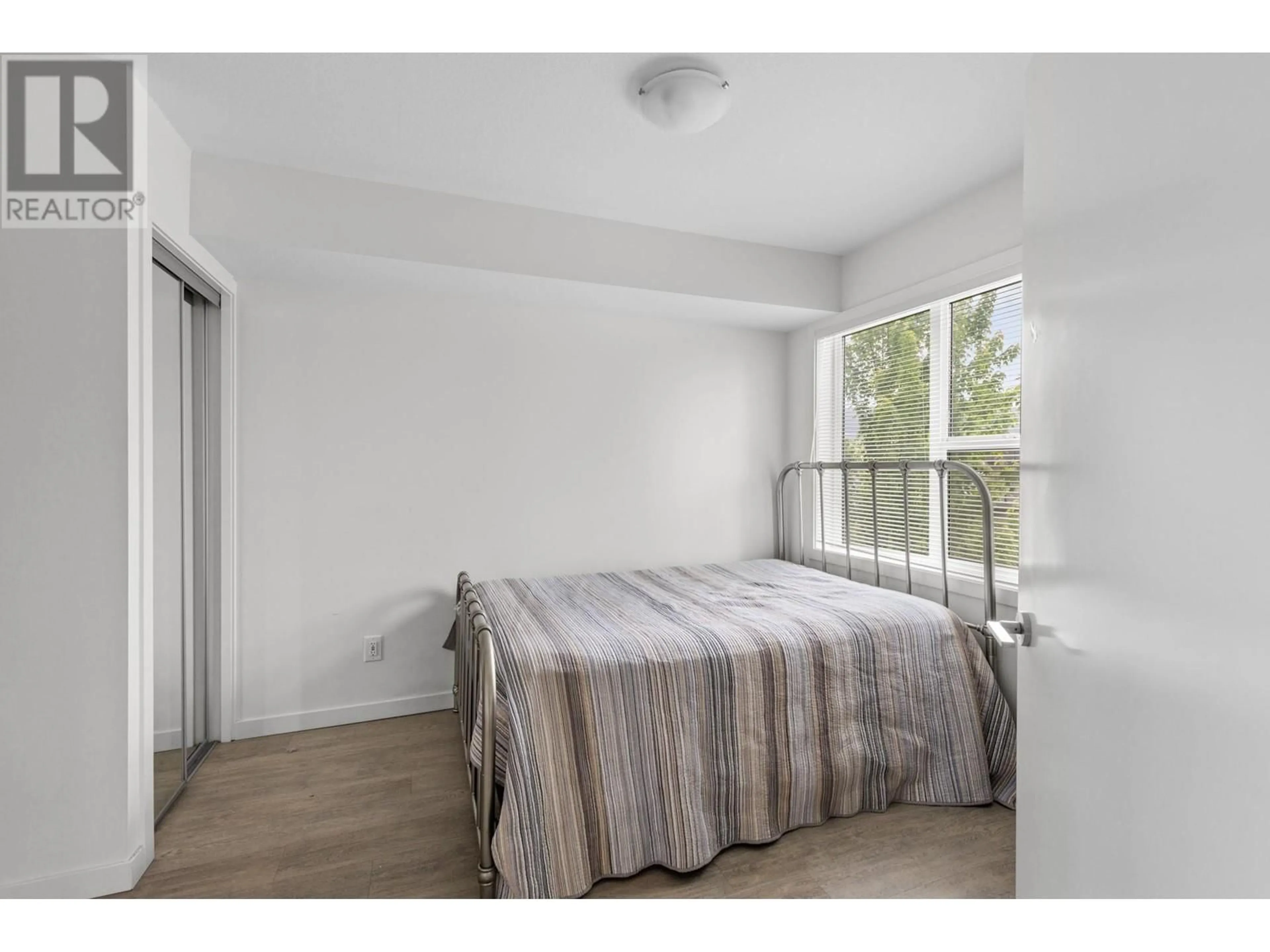 Bedroom with bed, unknown for 105 - 695 ACADEMY WAY, Kelowna British Columbia V1V0C7