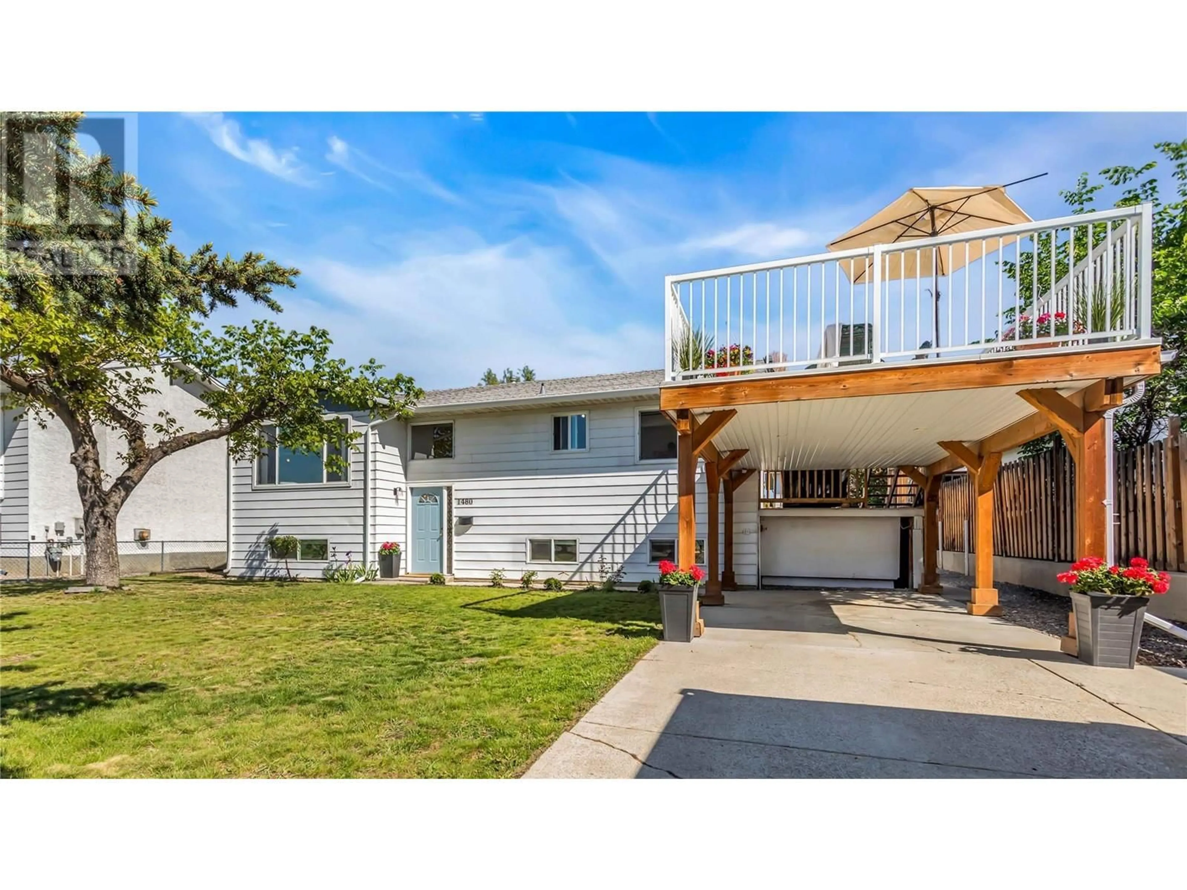 Home with vinyl exterior material, street for 1480 DENVER ROAD, Kelowna British Columbia V1Y8C2