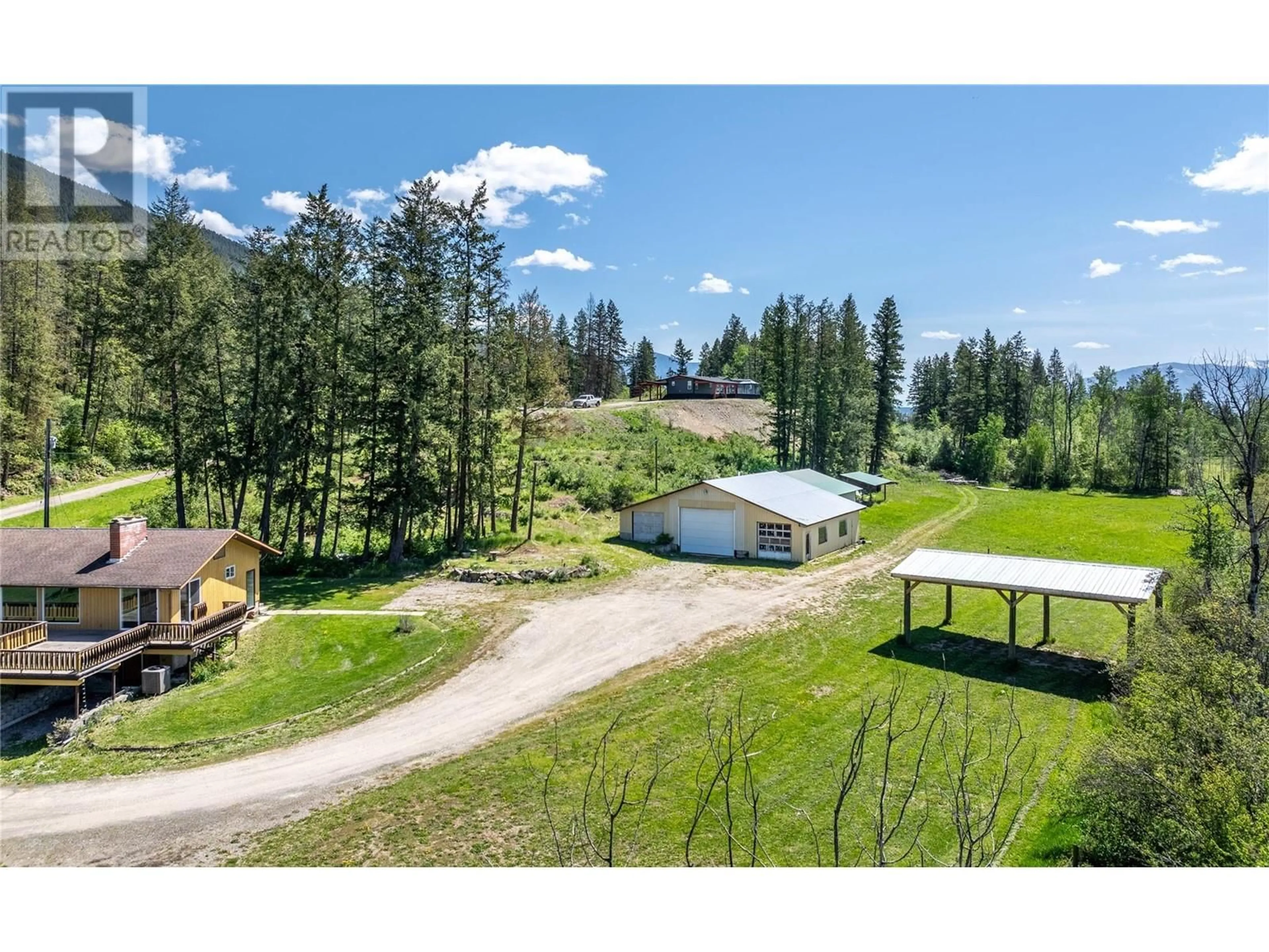 A pic from outside/outdoor area/front of a property/back of a property/a pic from drone, mountain view for 2303 CRUSHER ROAD, Creston British Columbia V0B1G8