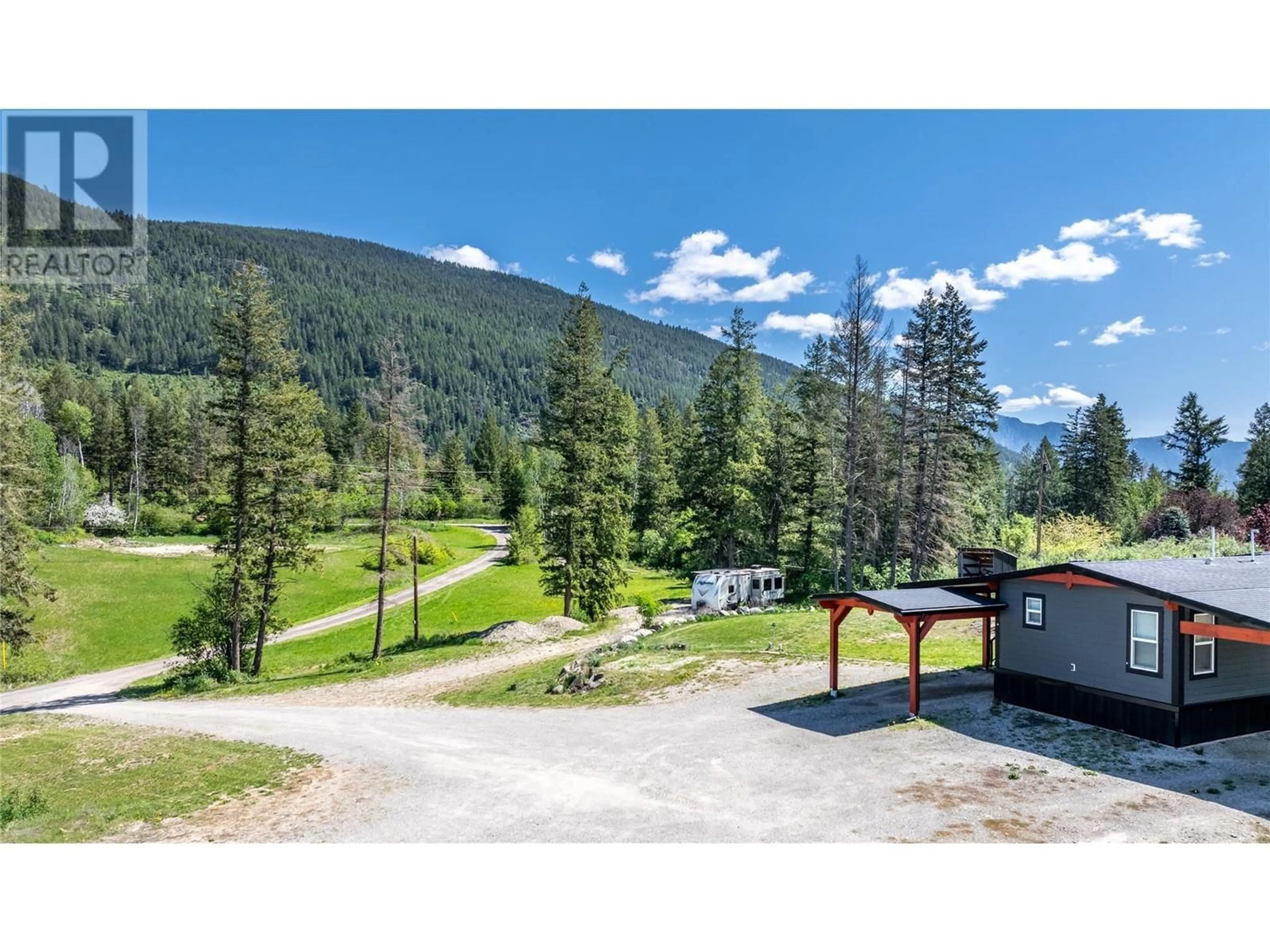 A pic from outside/outdoor area/front of a property/back of a property/a pic from drone, mountain view for 2303 CRUSHER ROAD, Creston British Columbia V0B1G8