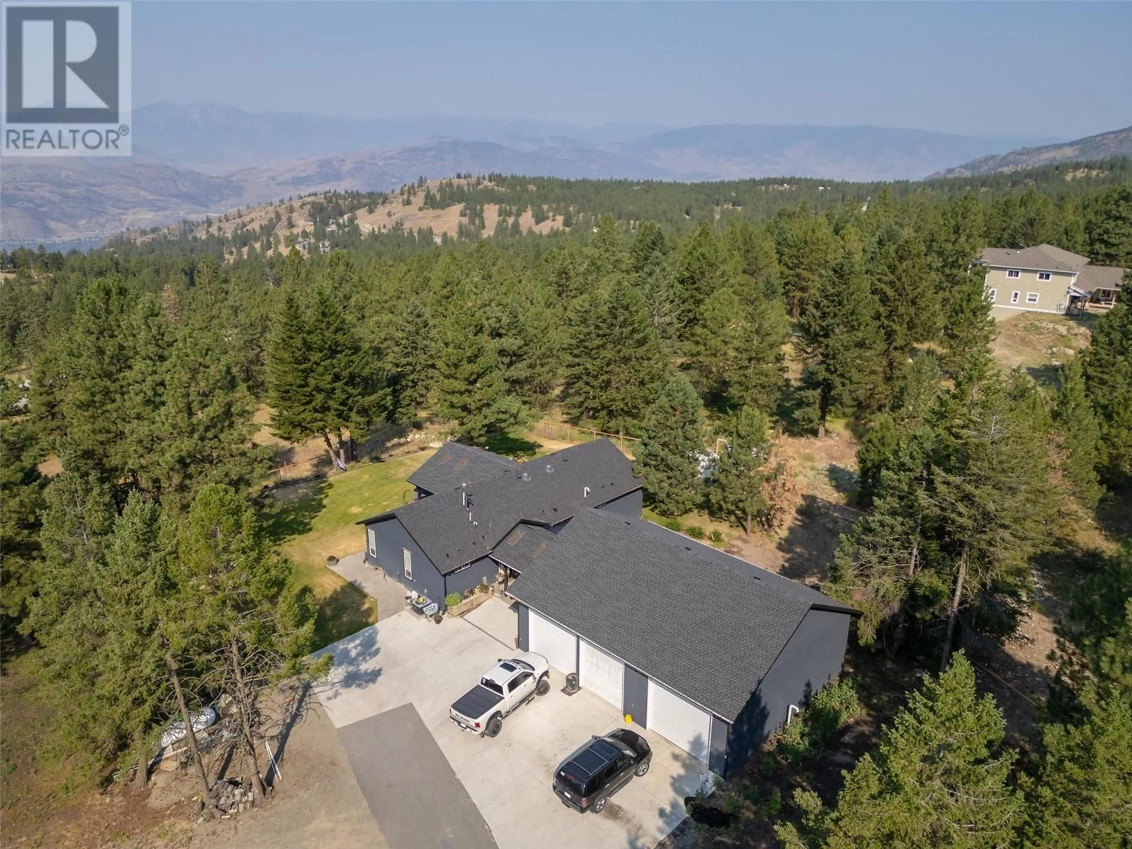 A pic from outside/outdoor area/front of a property/back of a property/a pic from drone, mountain view for 124 SASQUATCH TRAIL TRAIL, Osoyoos British Columbia V0H1V6
