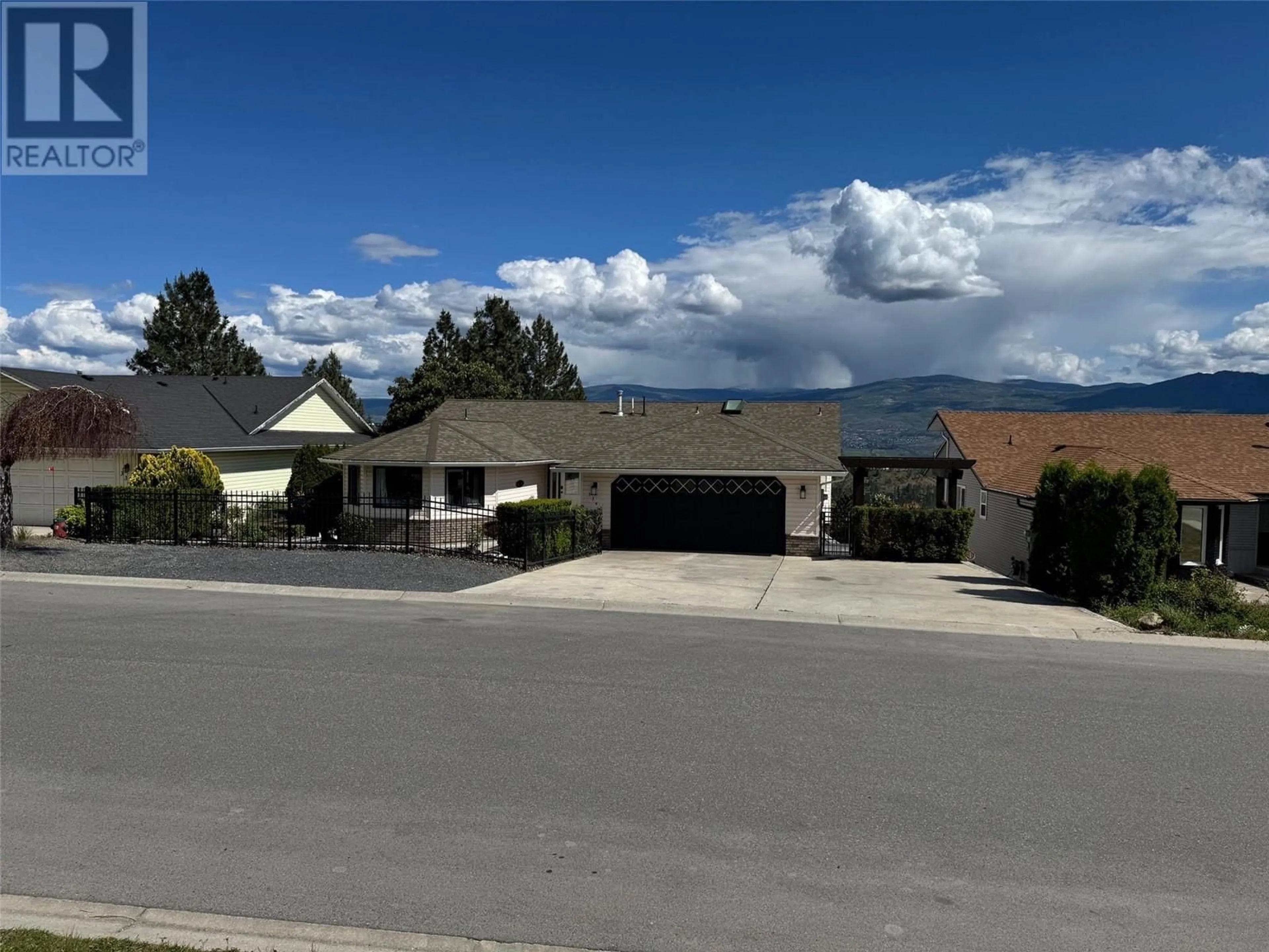 A pic from outside/outdoor area/front of a property/back of a property/a pic from drone, mountain view for 3343 SUNDANCE DRIVE, West Kelowna British Columbia V4T1S5