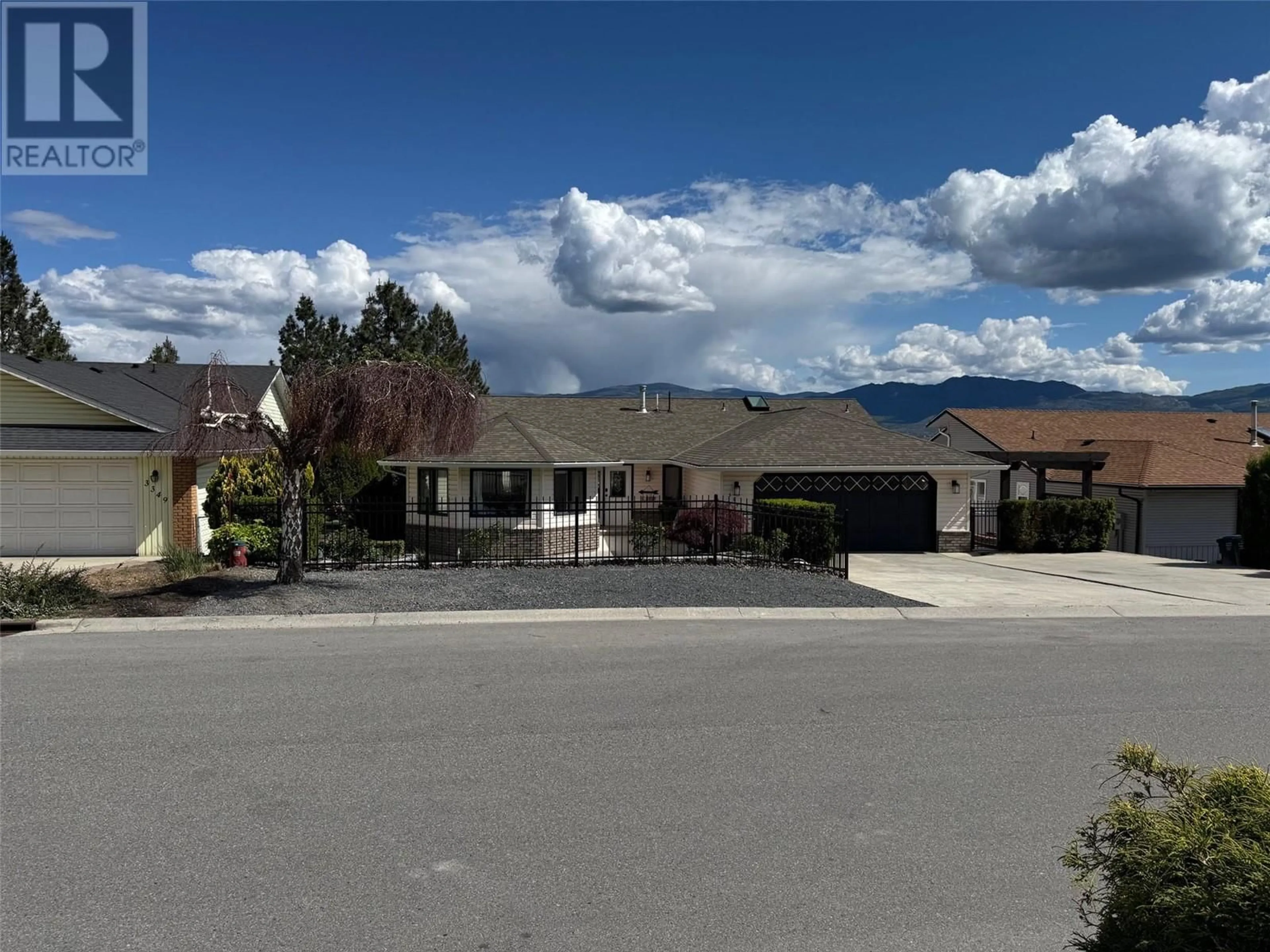 A pic from outside/outdoor area/front of a property/back of a property/a pic from drone, mountain view for 3343 SUNDANCE DRIVE, West Kelowna British Columbia V4T1S5