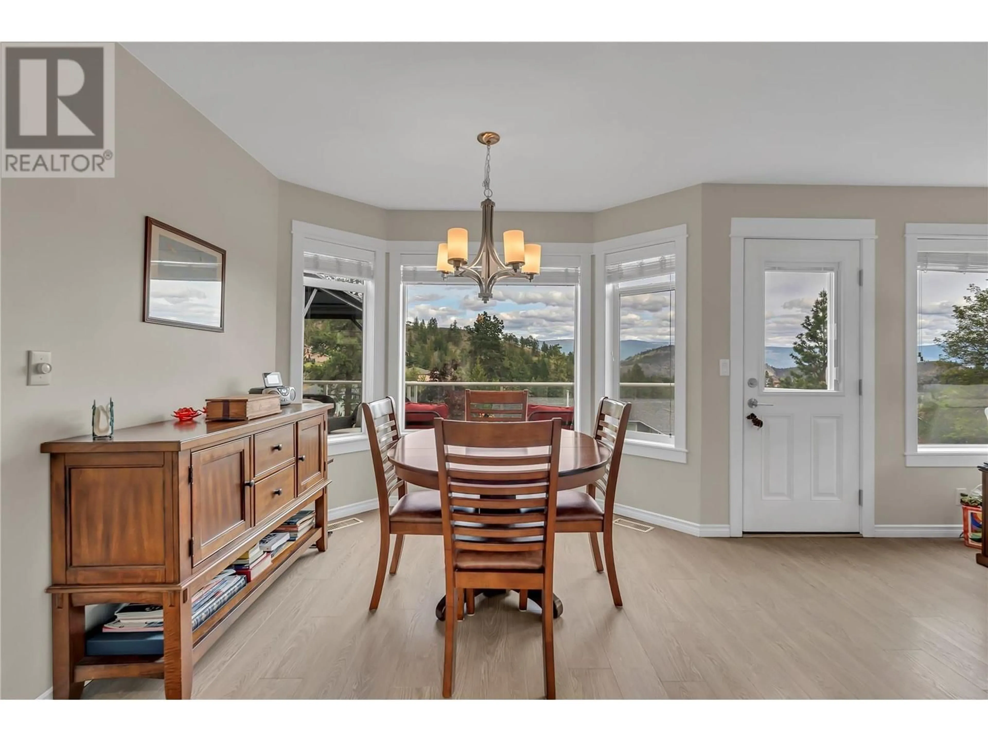 Dining room, wood/laminate floor for 12823 MCLARTY PLACE, Summerland British Columbia V0H1Z8