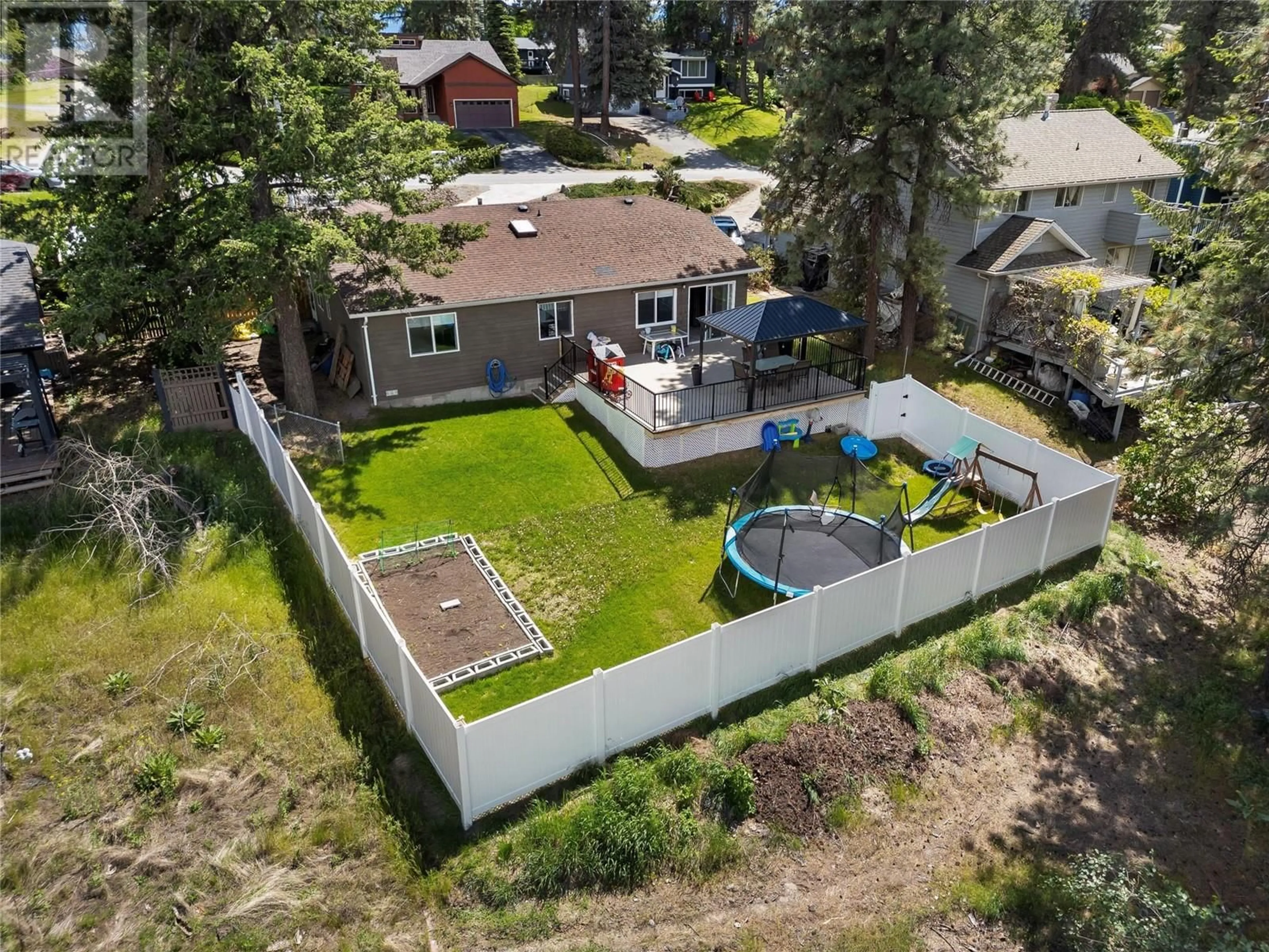 A pic from outside/outdoor area/front of a property/back of a property/a pic from drone, water/lake/river/ocean view for 2036 TOMAT AVENUE, West Kelowna British Columbia V1Z3C5